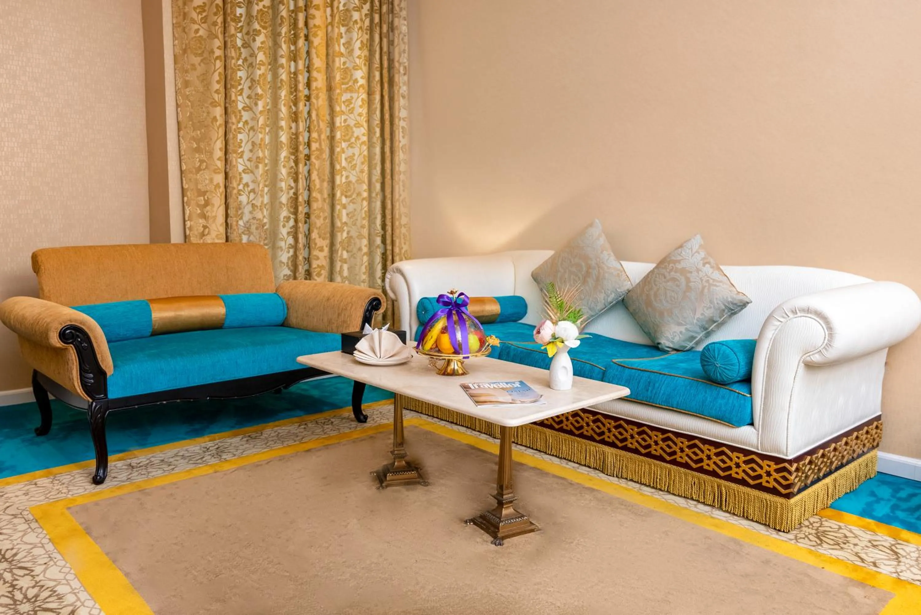 Living room in Saraya Corniche Hotel