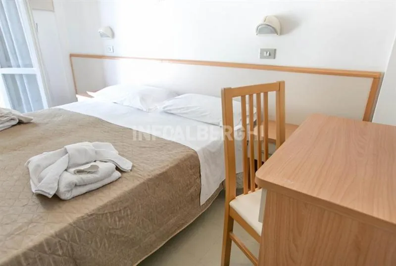 Bed in Hotel Paradiso