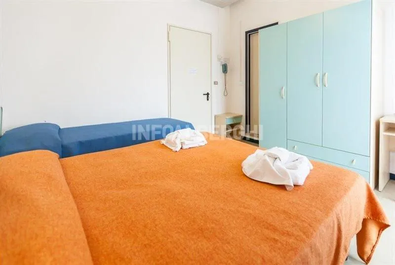 Bed in Hotel Paradiso