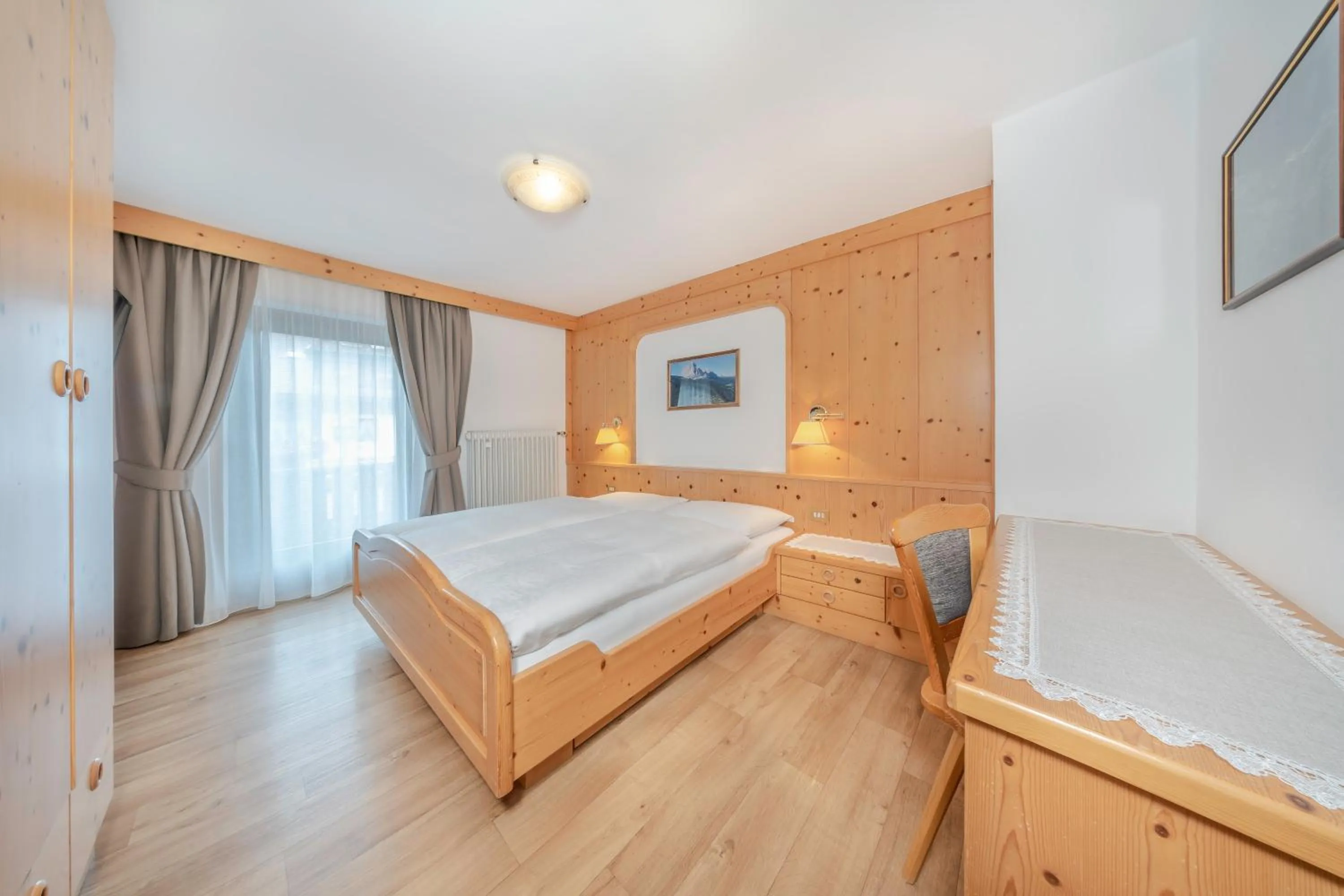 Photo of the whole room, Bed in Garni Tramans