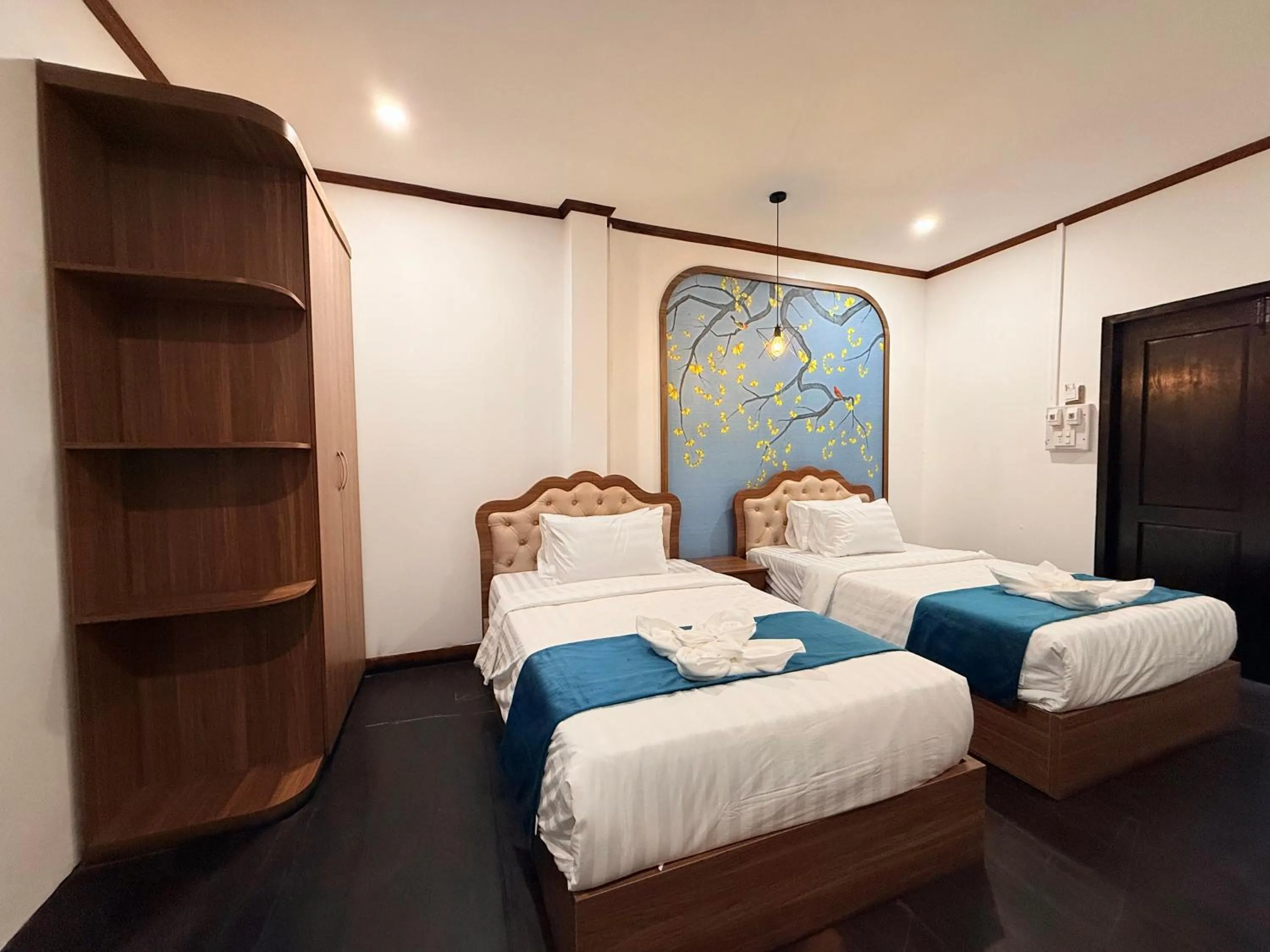 Bed in Vangvieng Night Market Resort