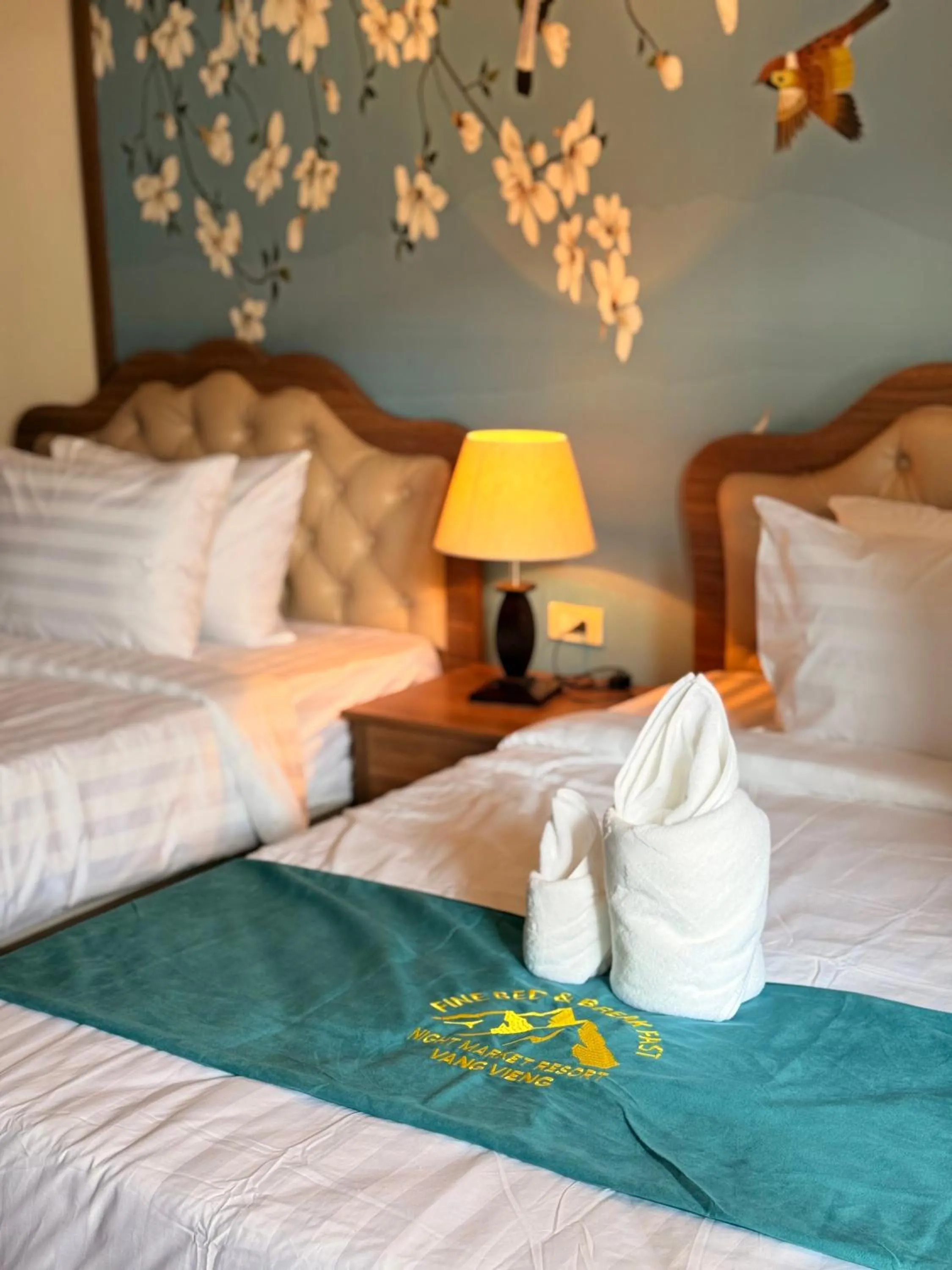 Bed in Vangvieng Night Market Resort