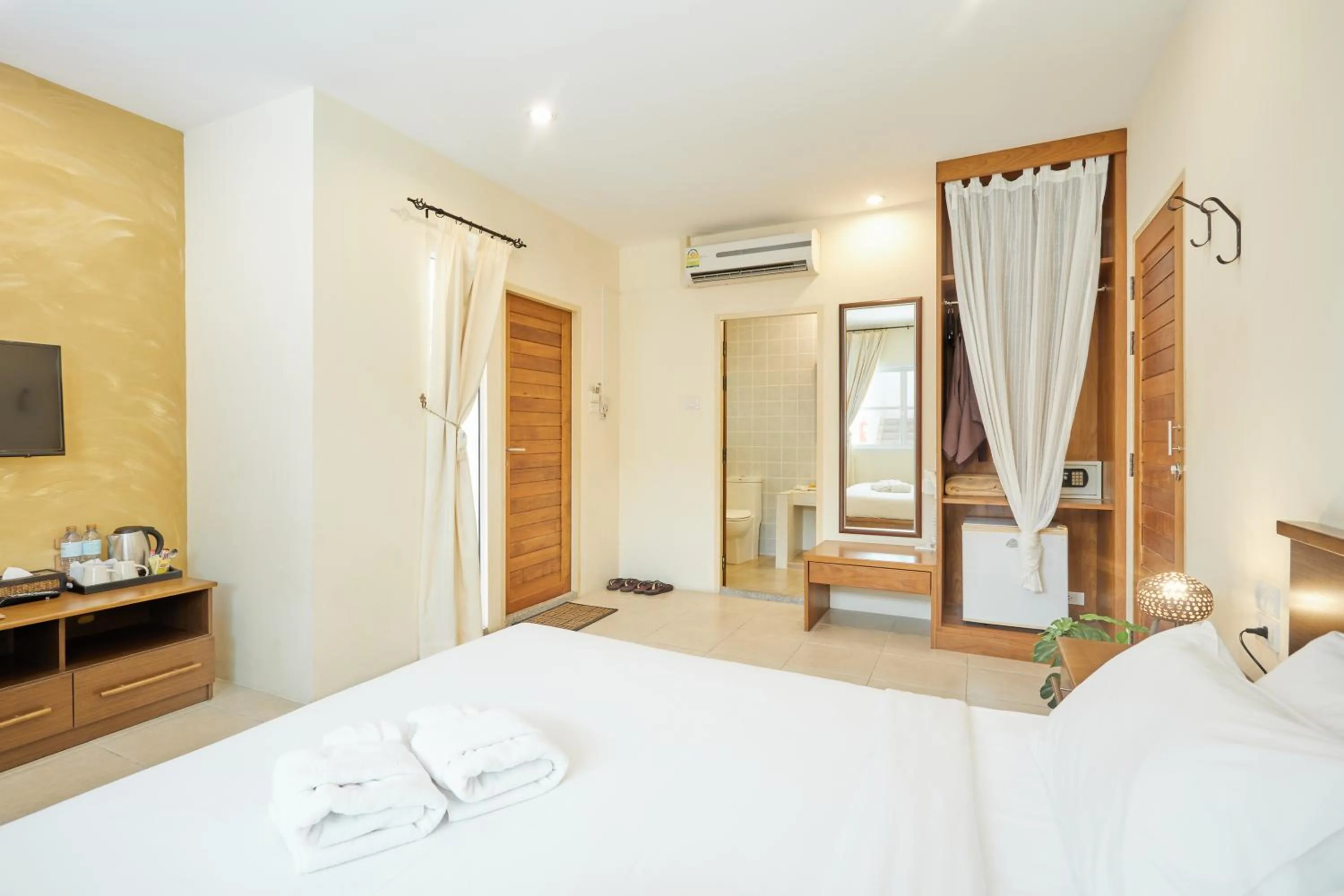 Bed in Talay Hotel and Villa Cha-am