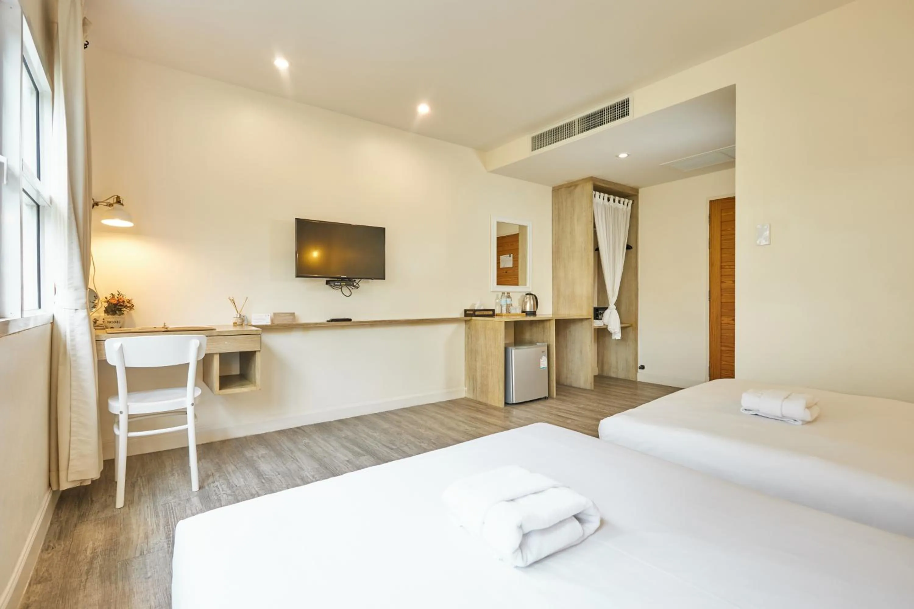 Bed in Talay Hotel and Villa Cha-am