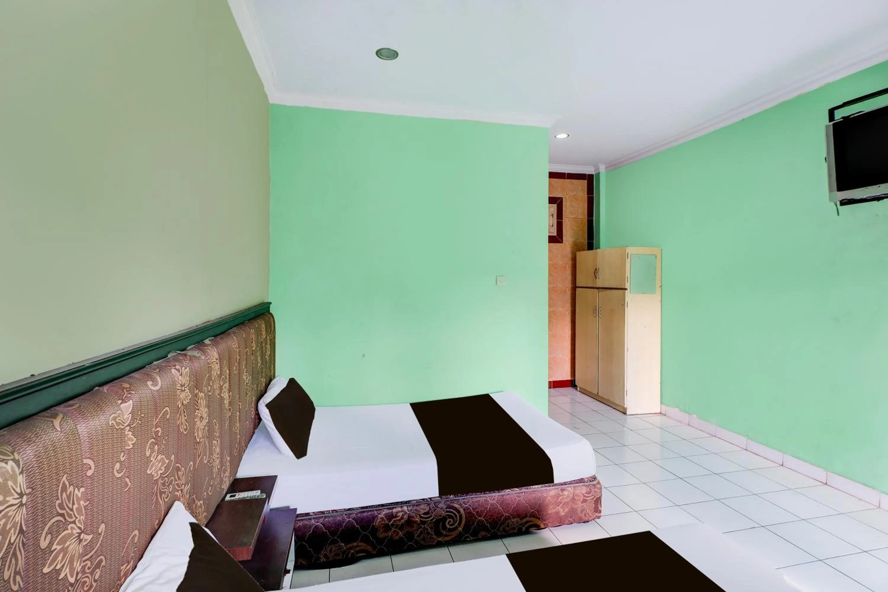 Bedroom in Collection O Bali near Terminal Ubung formerly Batukaru Garden Hotel