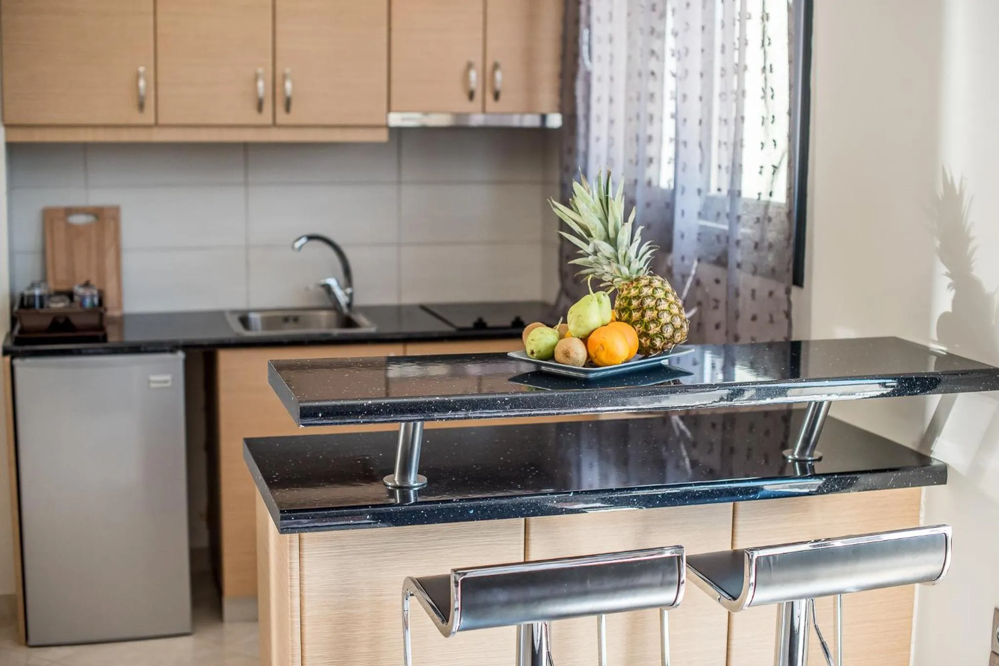Kitchen or kitchenette in Golden Sun Villas