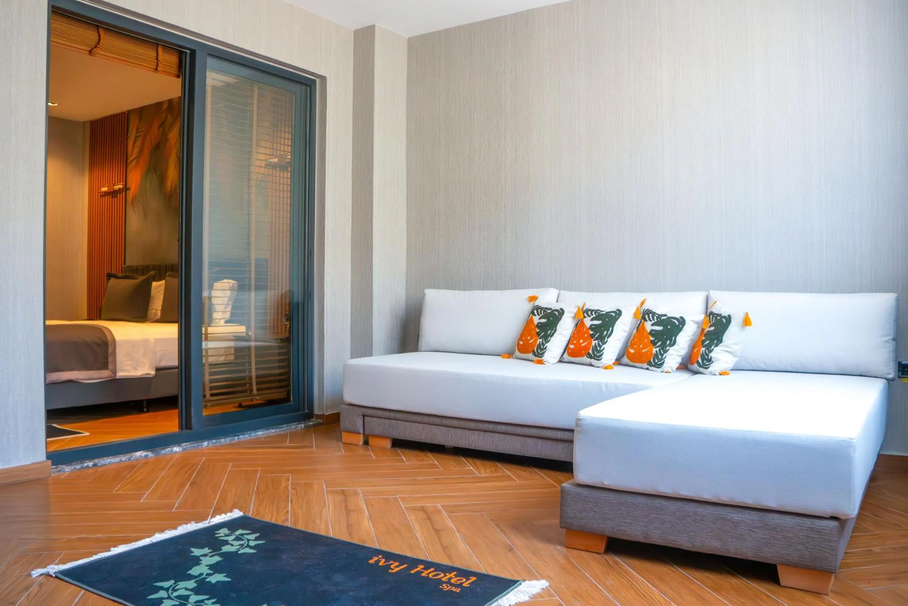 Living room, Bed in ivy Hotel Spa