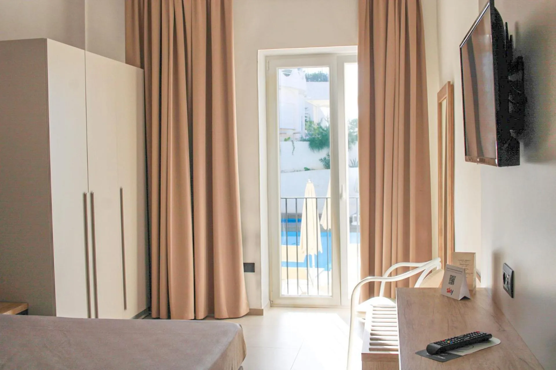 Bed in Hotel Falcone