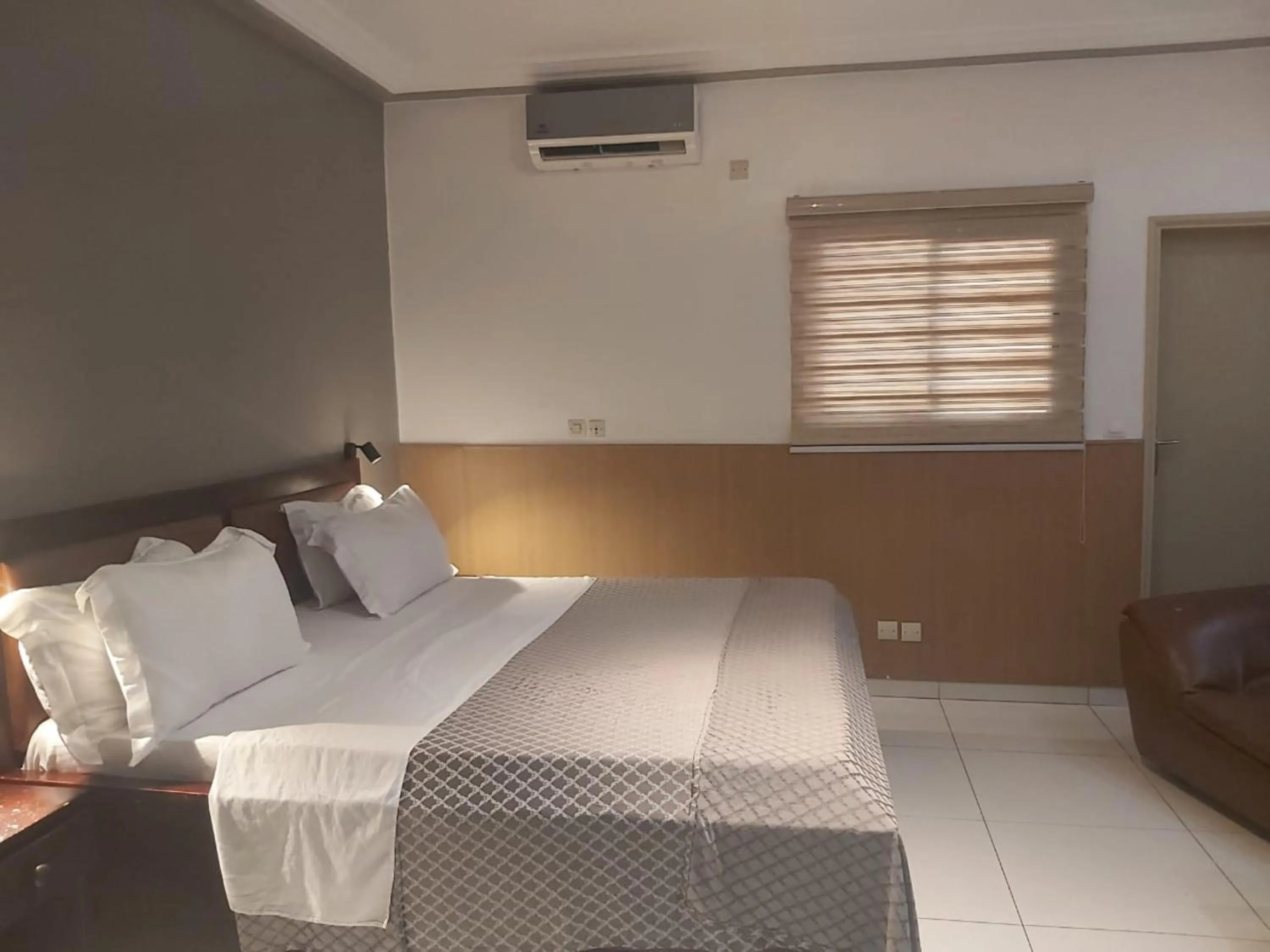 Bed in Hotel Carmel Cocody