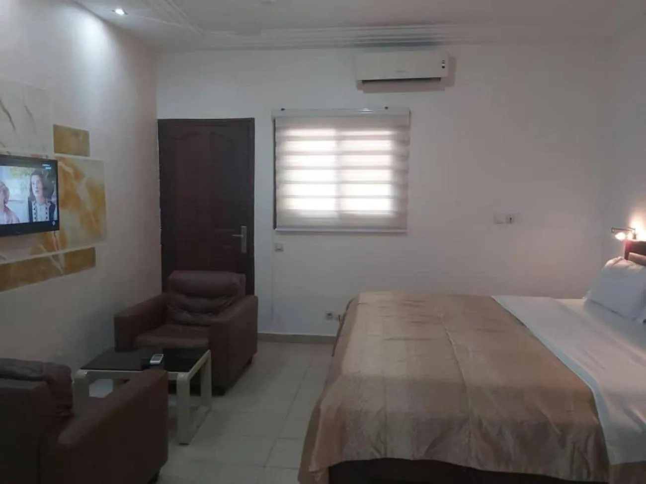 Bed in Hotel Carmel Cocody