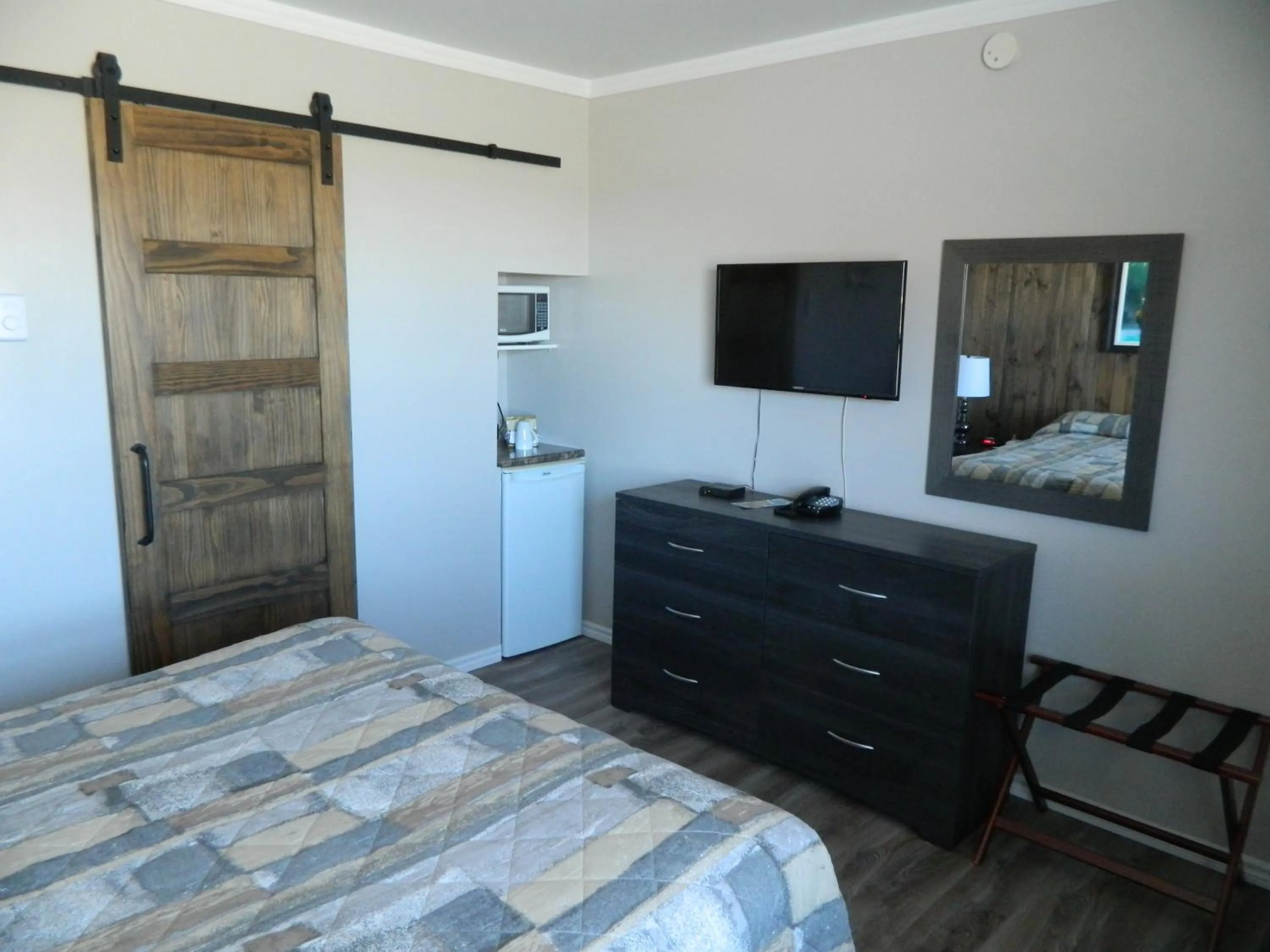 Bed in Le Pirate Motel et Camping