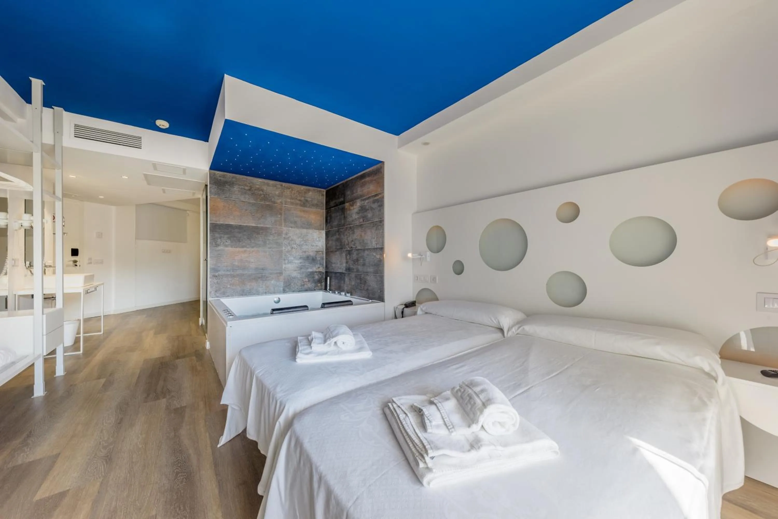 Photo of the whole room, Bed in Welikehotel Triton Beach