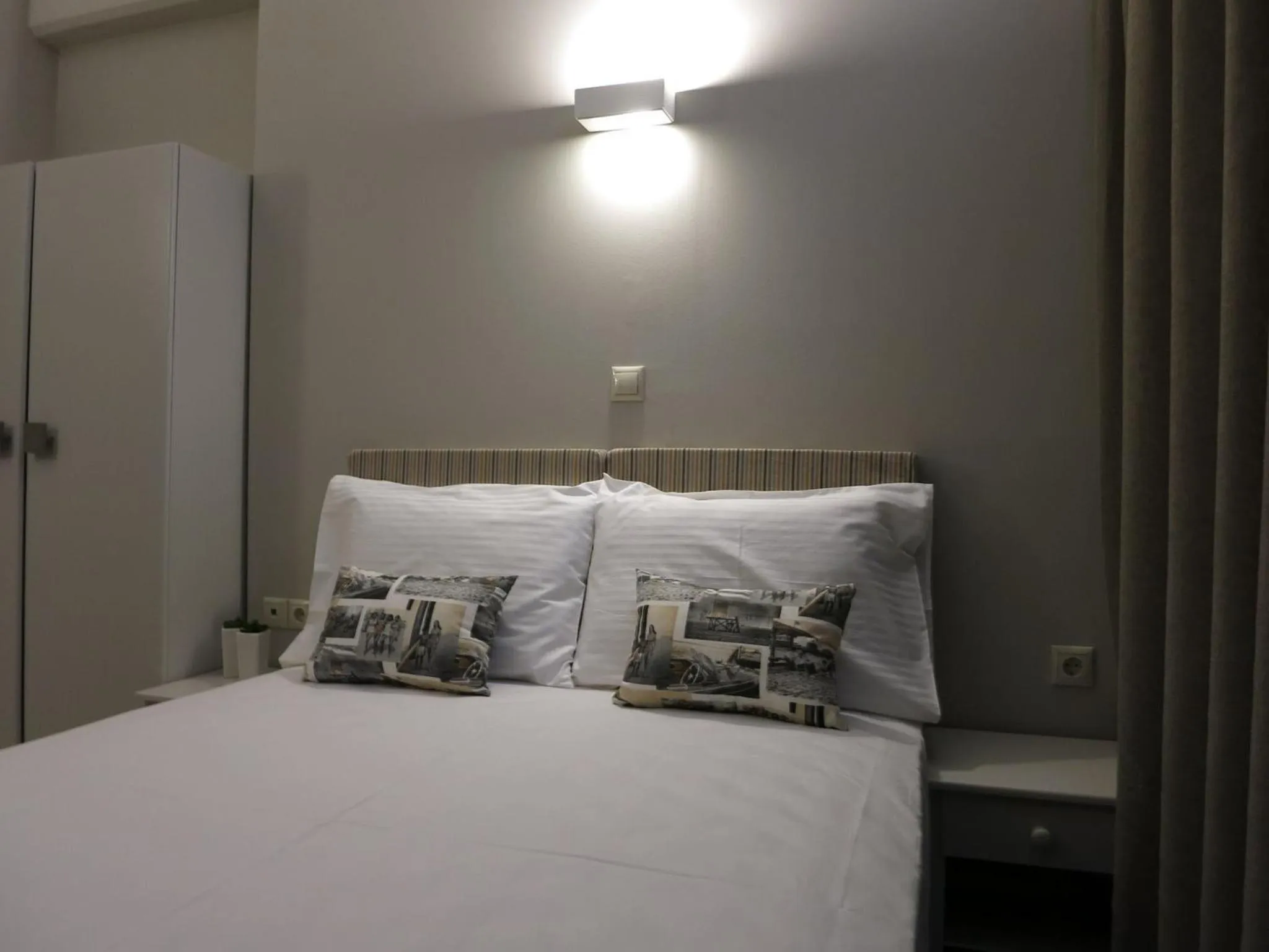 Bed in Pantheon Aparthotel