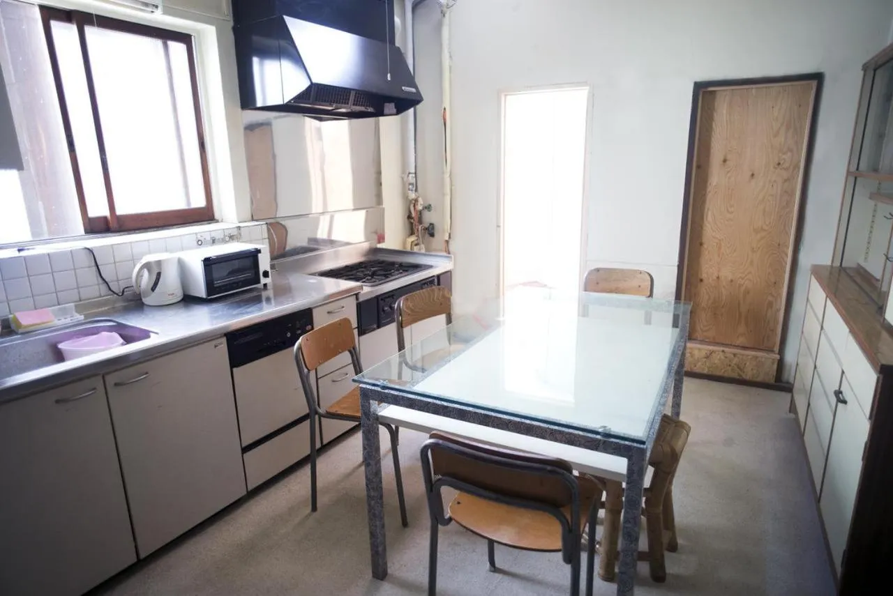 Kitchen or kitchenette in Worldtreck Dinner & Guesthouse Pise