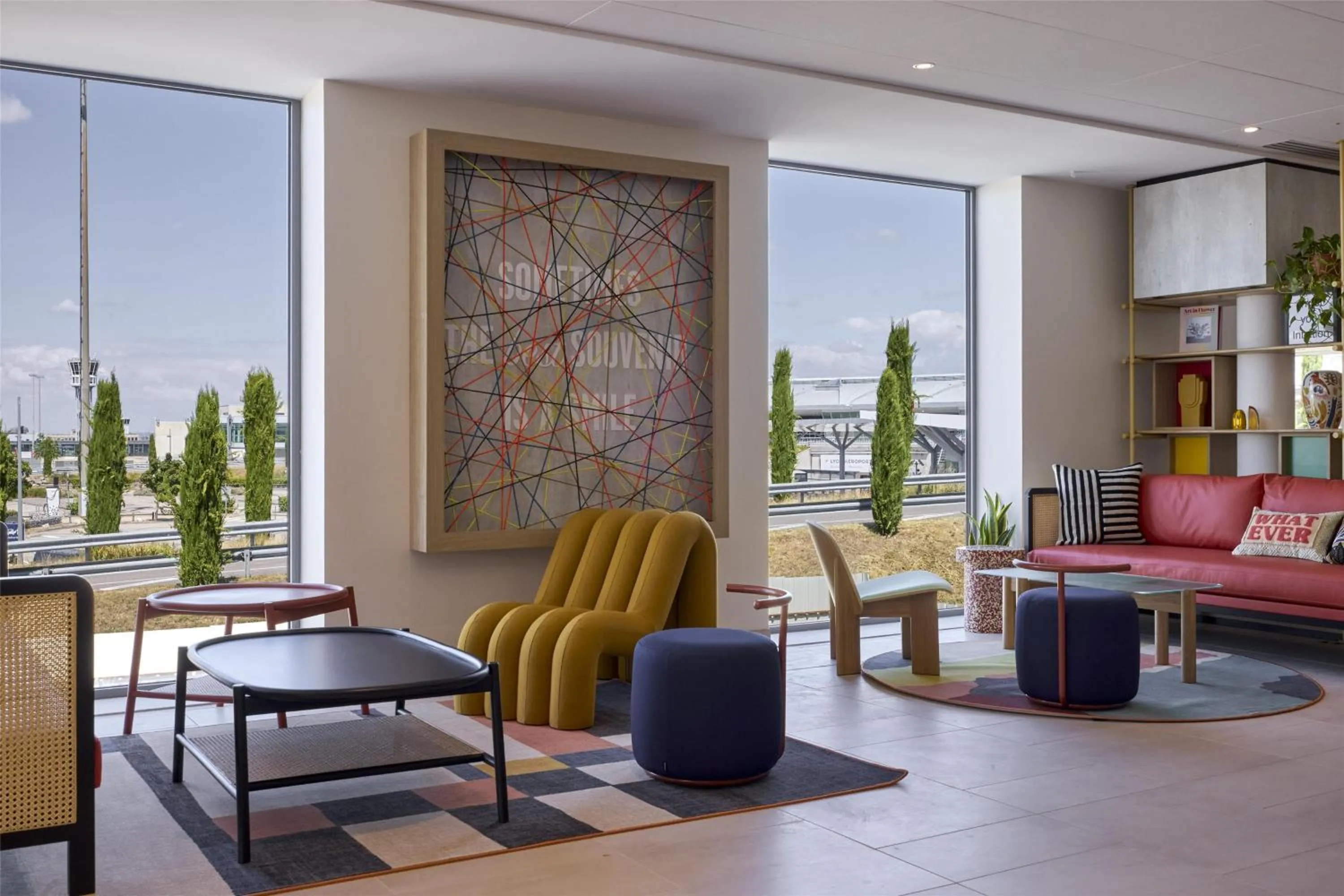 Lobby or reception in Hampton By Hilton Lyon Airport