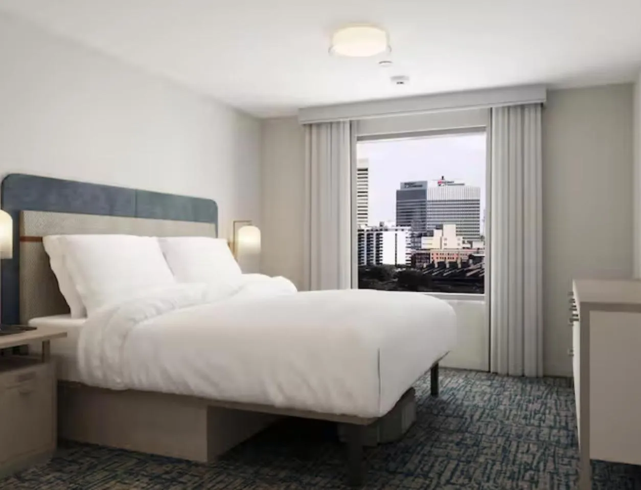 Bed in Homewood Suites By Hilton Wichita Airport