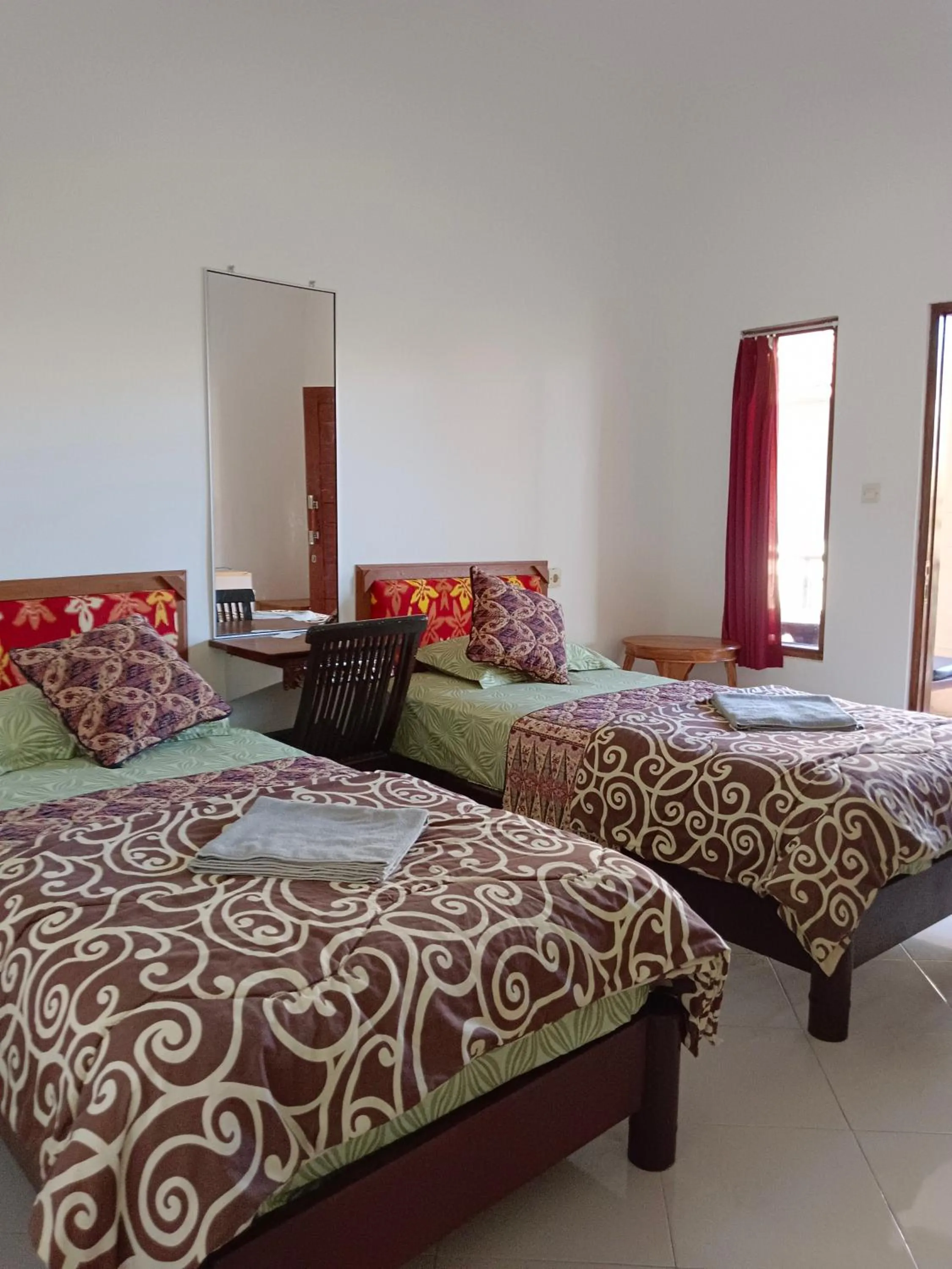 Bed in Double N Guesthouse Sanur Bali