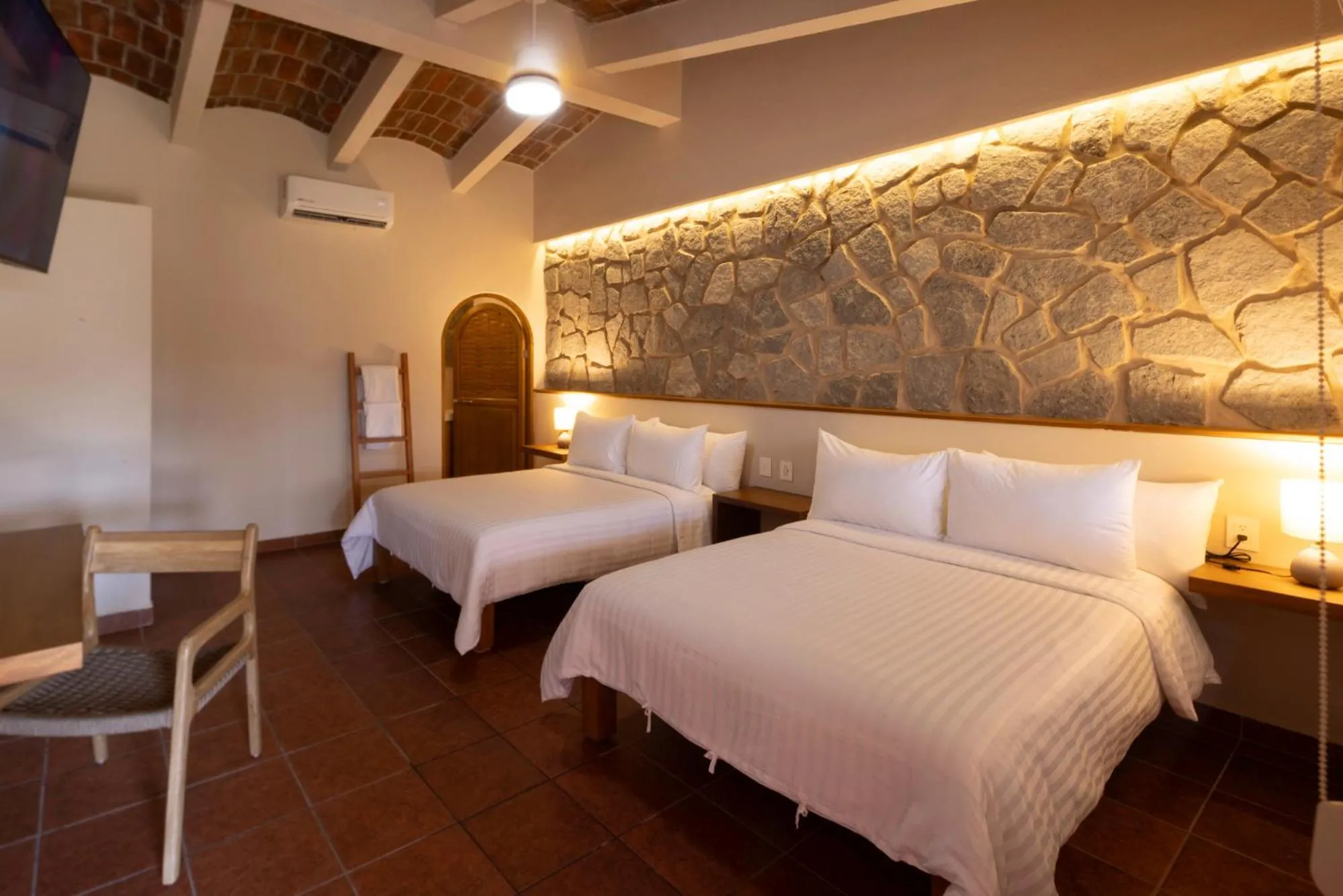 air conditioner, Bed in La Posada Hotel Boutique