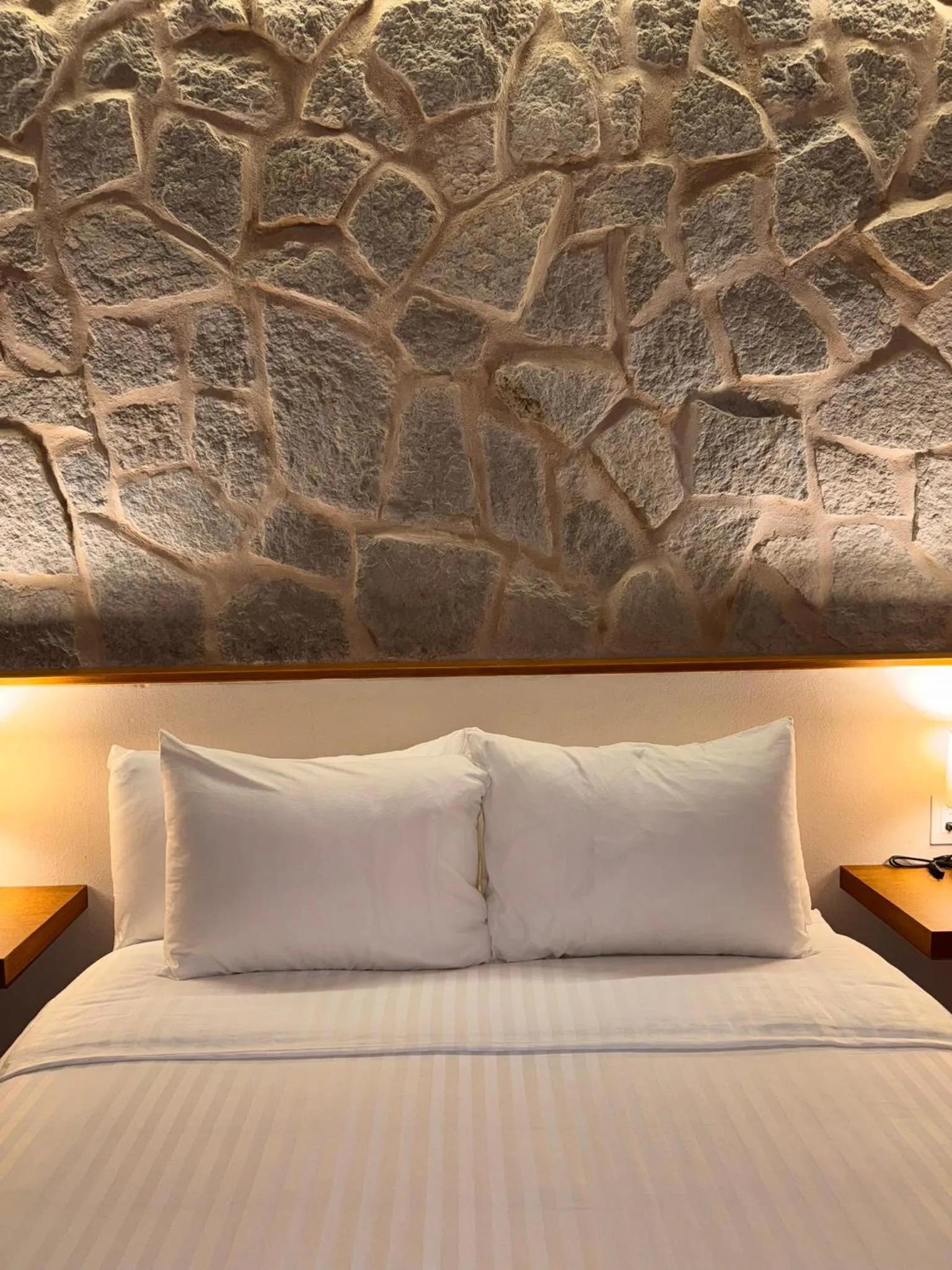 Bed in La Posada Hotel Boutique