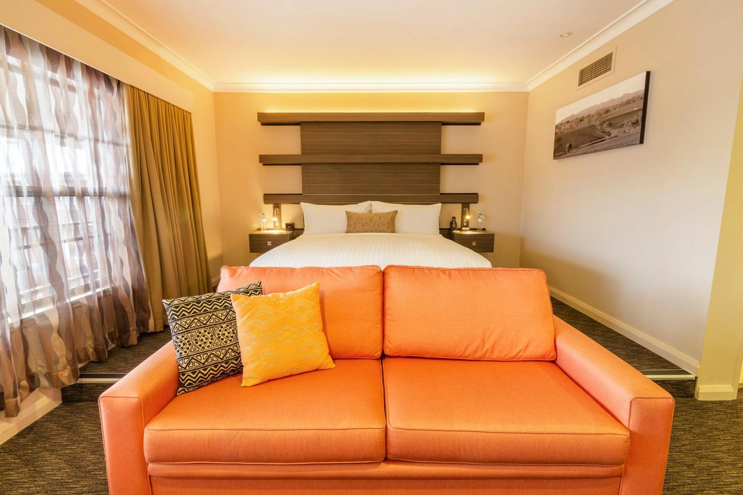 Photo of the whole room, Bed in Mercure Orange