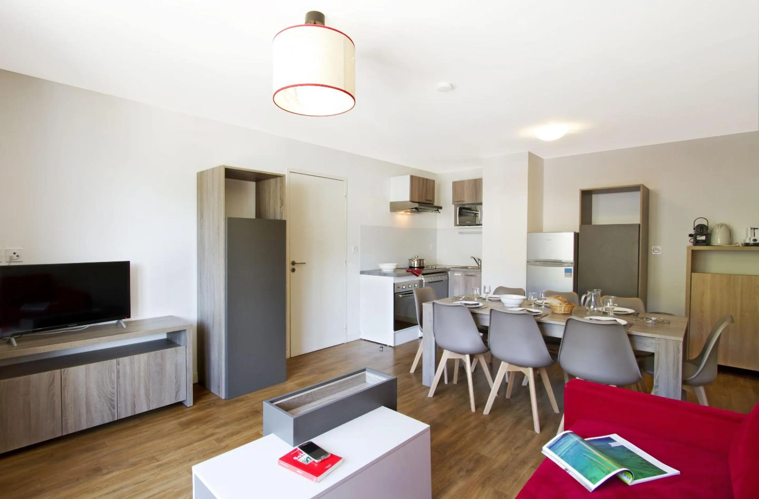 Kitchen or kitchenette in Résidence Odalys Les Balcons d'Auréa