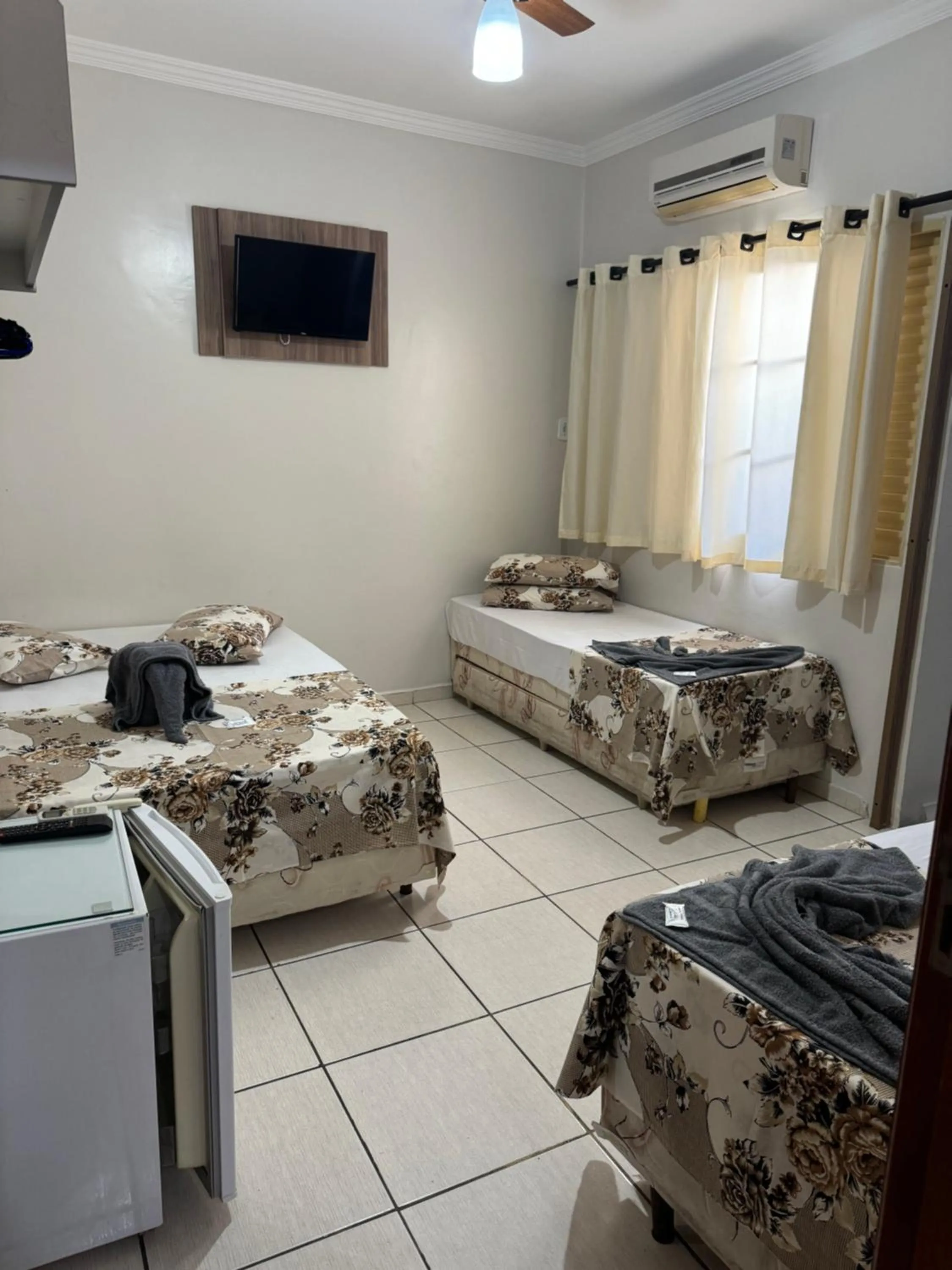 TV and multimedia, Bed in Pousada Rabake