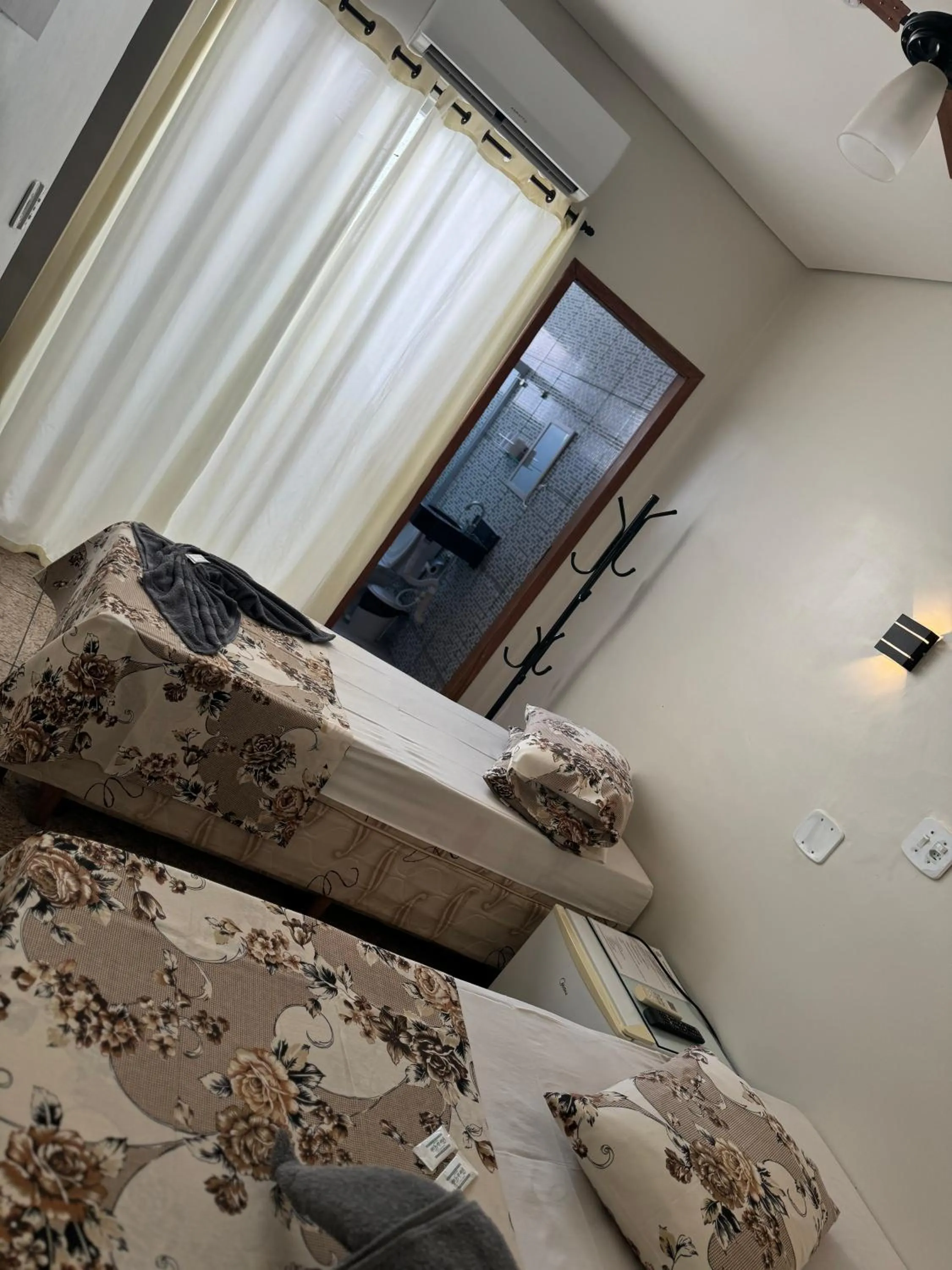 TV and multimedia, Bed in Pousada Rabake