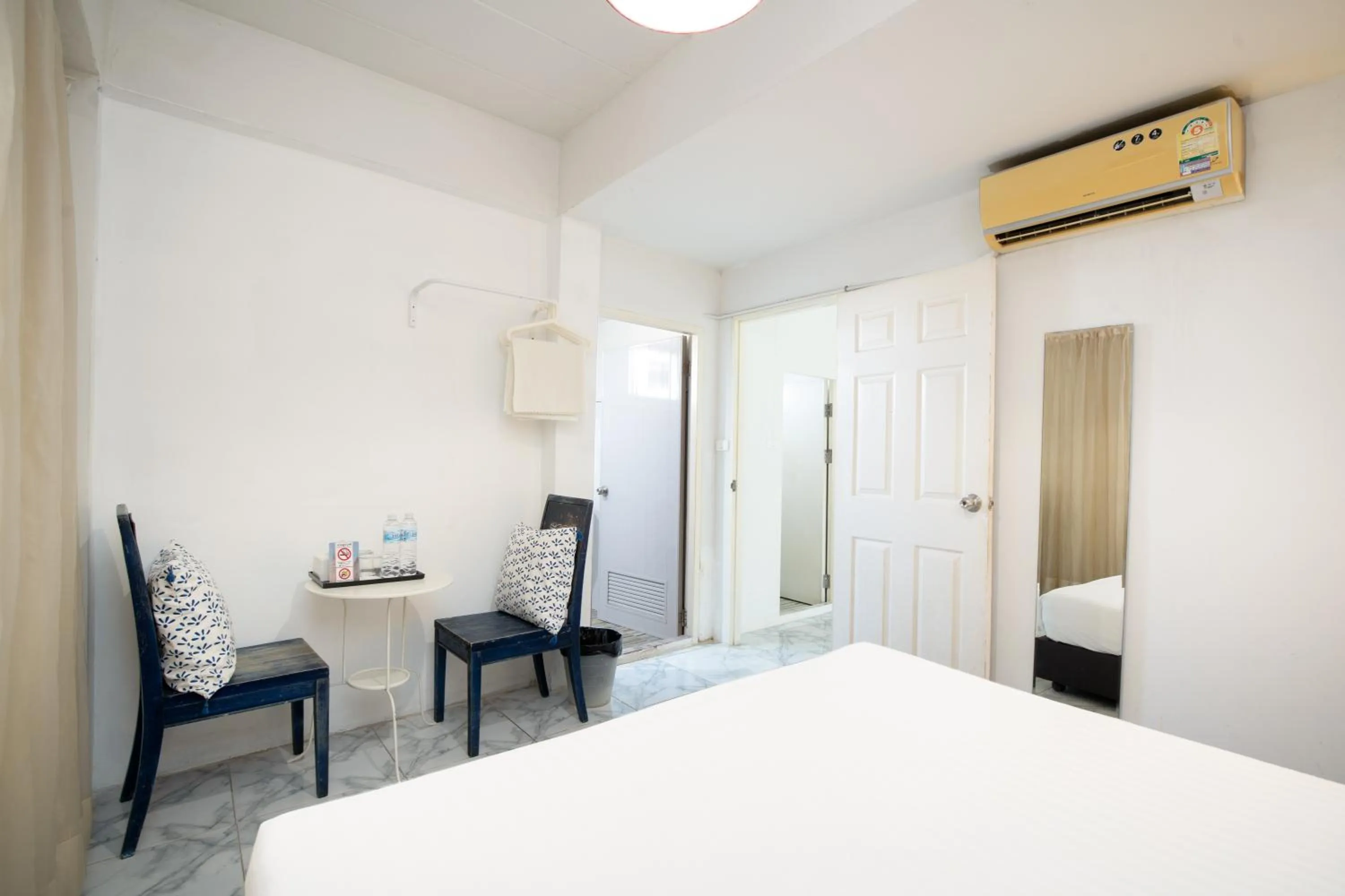 Seating area, Bed in Take a Rest Donmueang