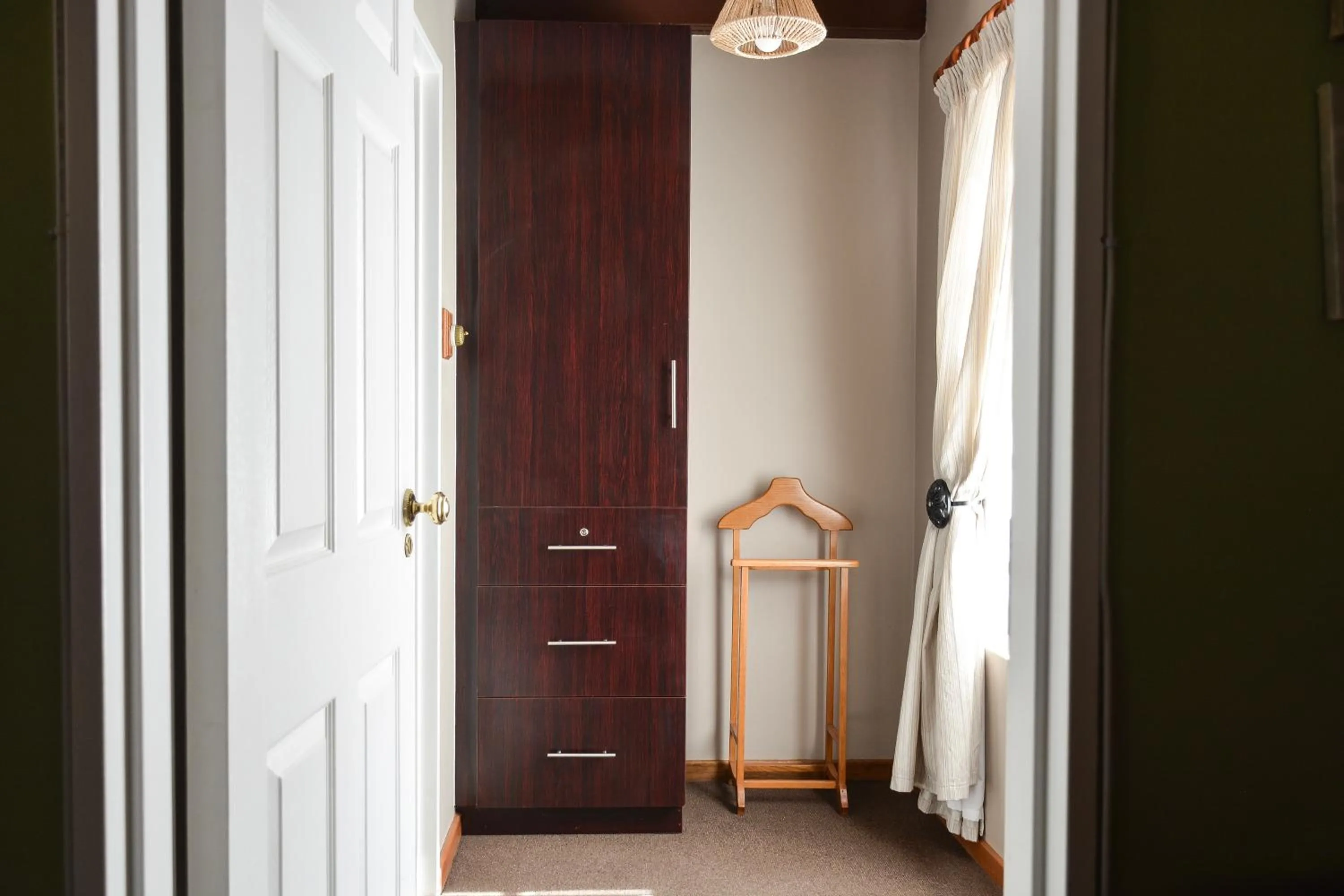wardrobe in Biggy Best Boutique Hotel & Self Catering Cottages