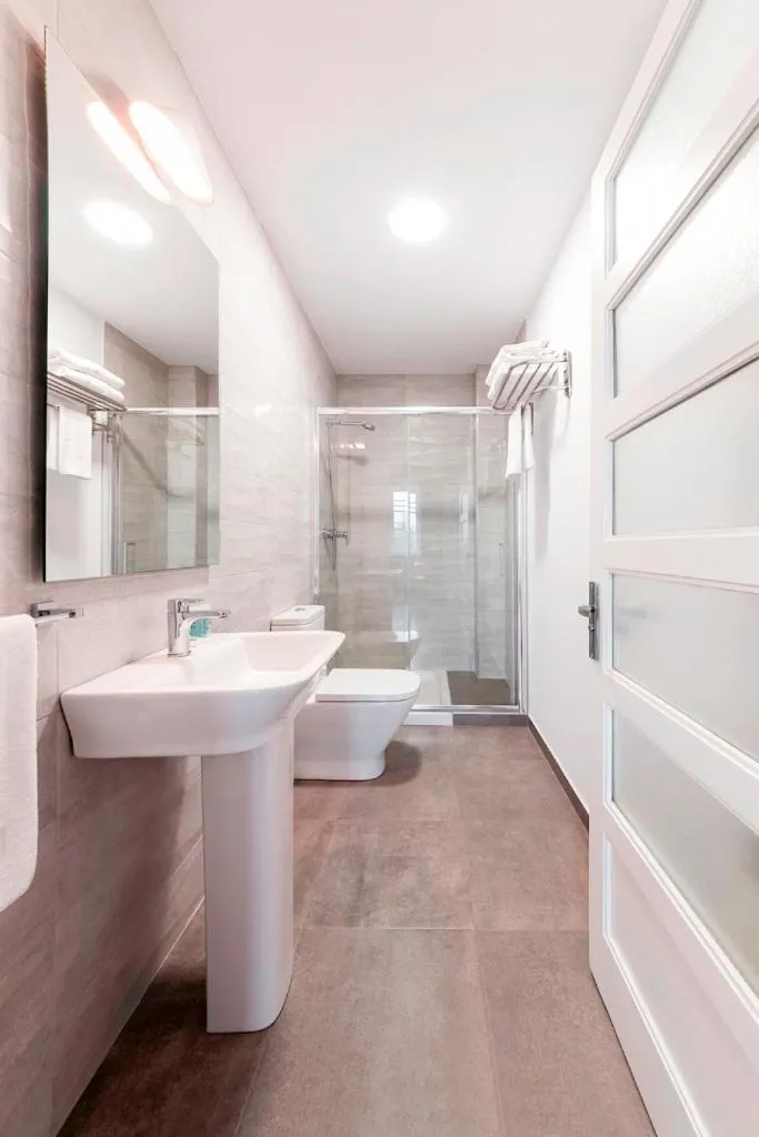 Bathroom in Lux Apartamentos Santiago