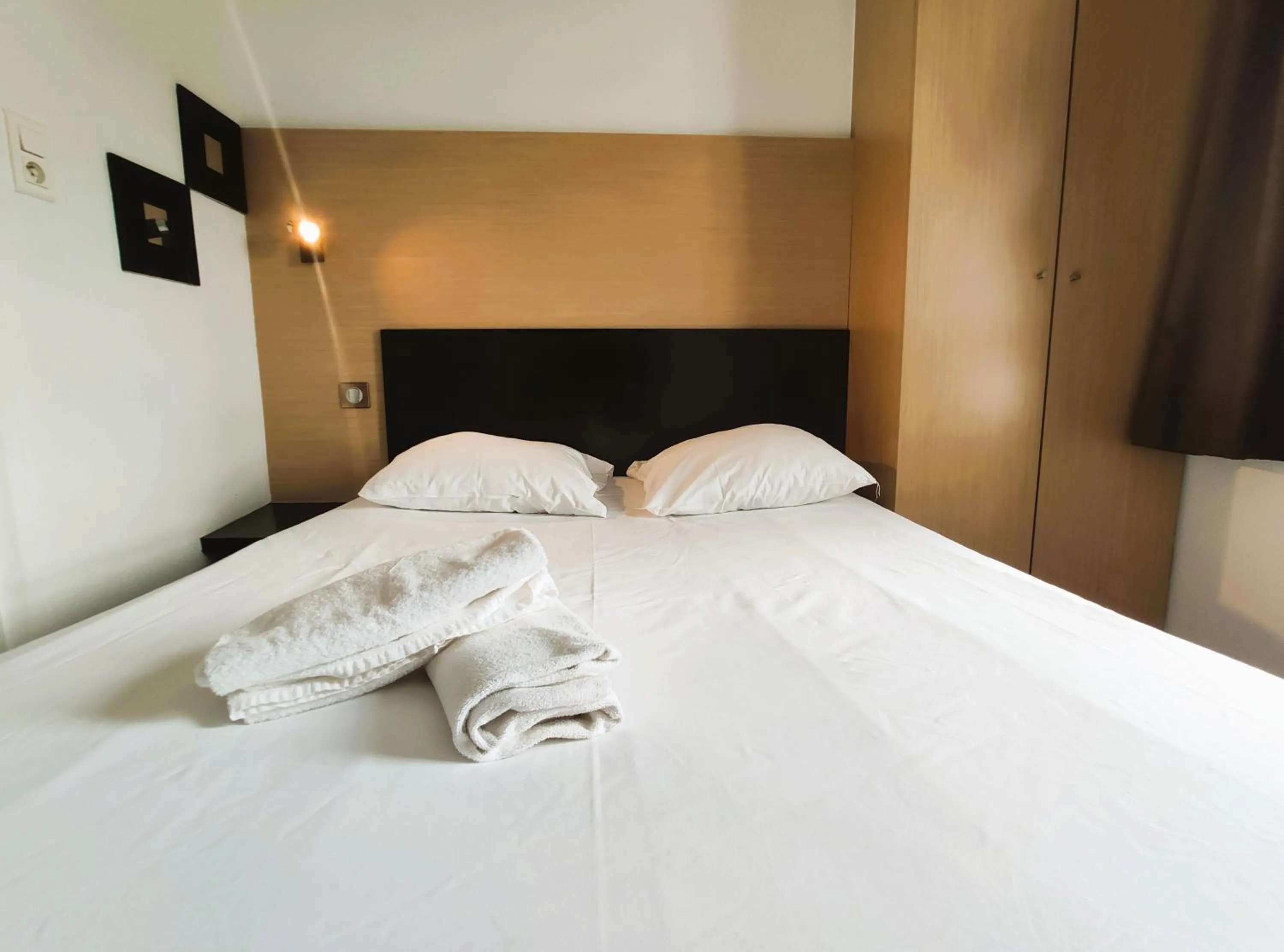 Bed in Hôtel Akena Pierrelaye