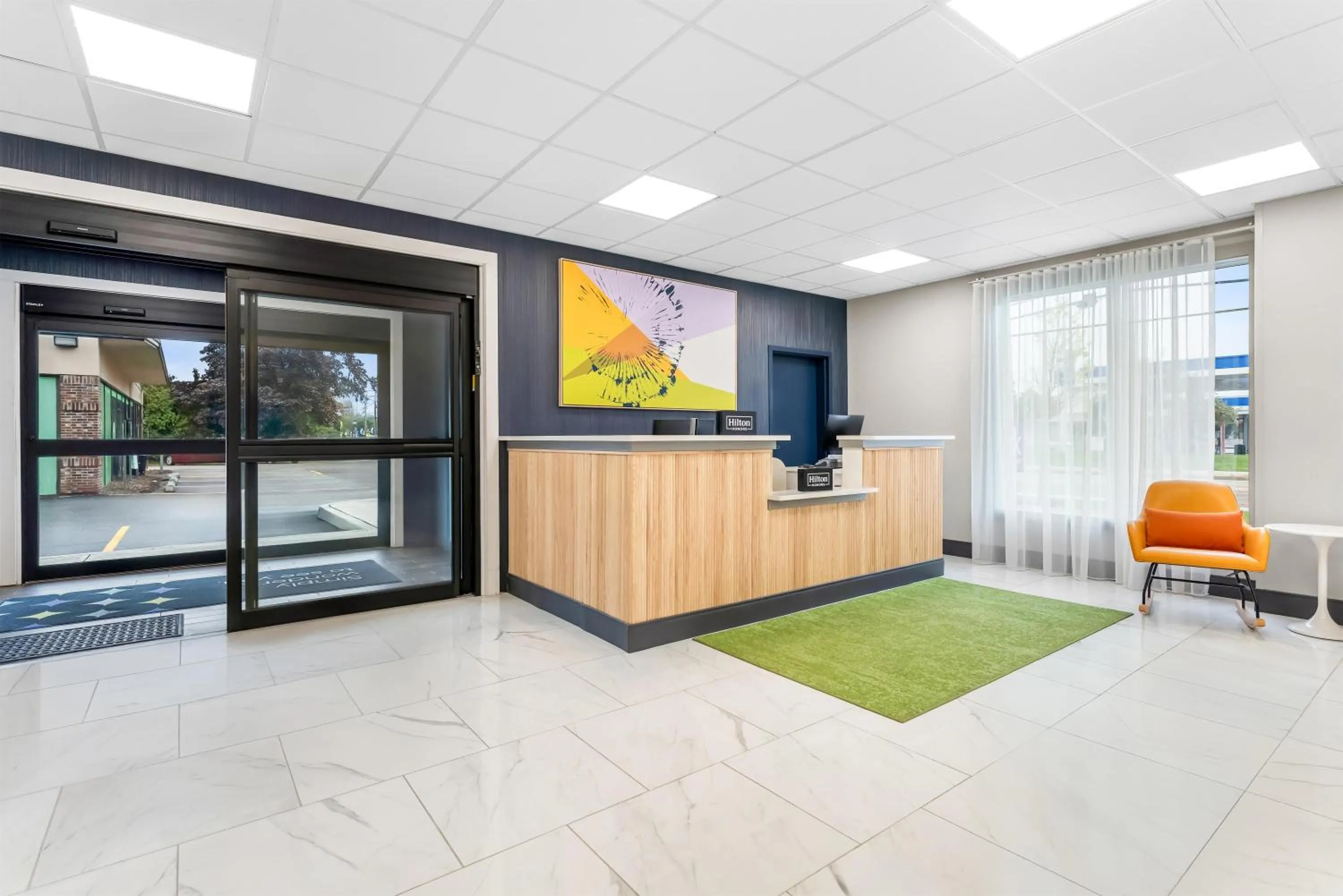 Lobby or reception in Spark by Hilton Essex Junction