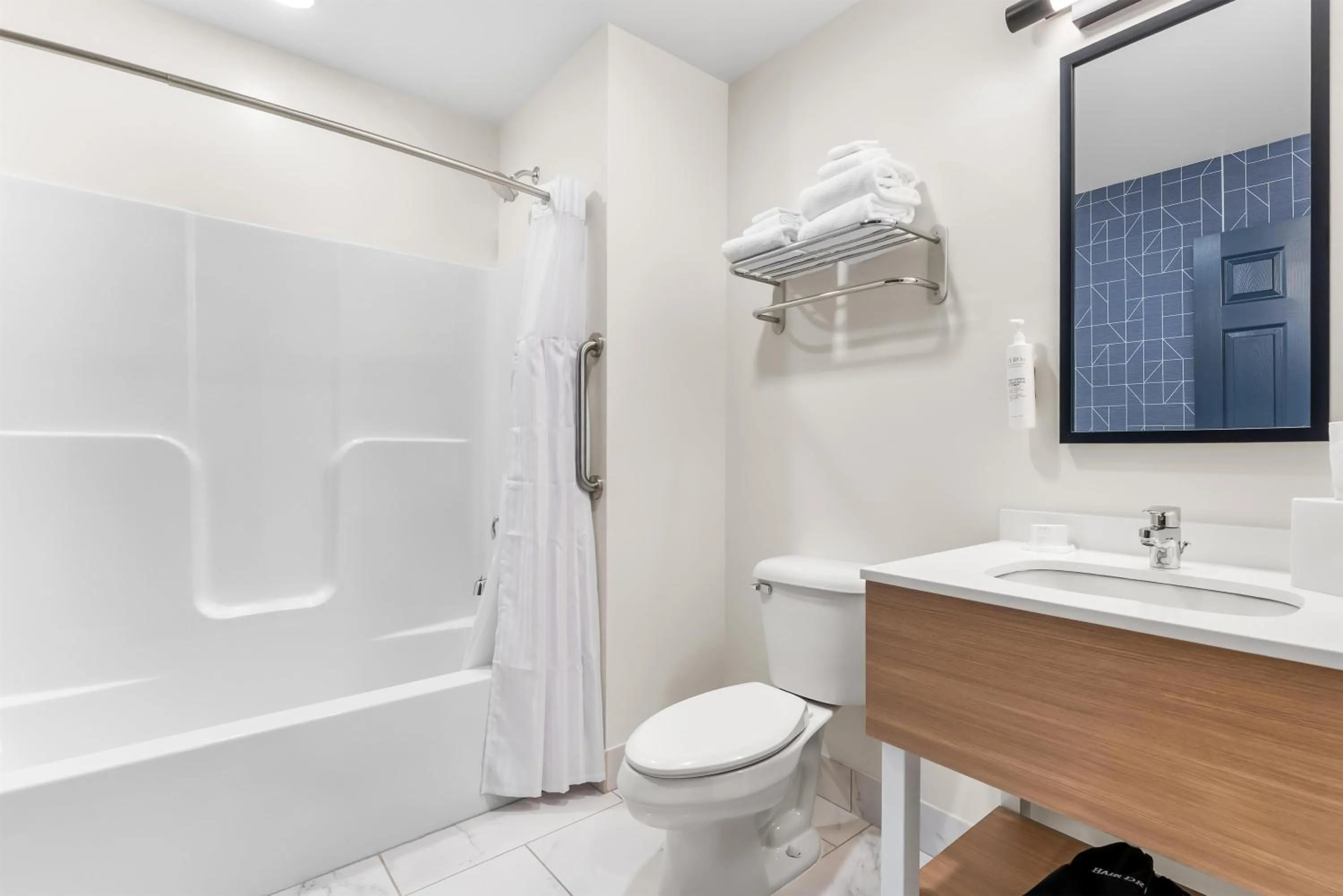 Bathroom in Spark by Hilton Essex Junction