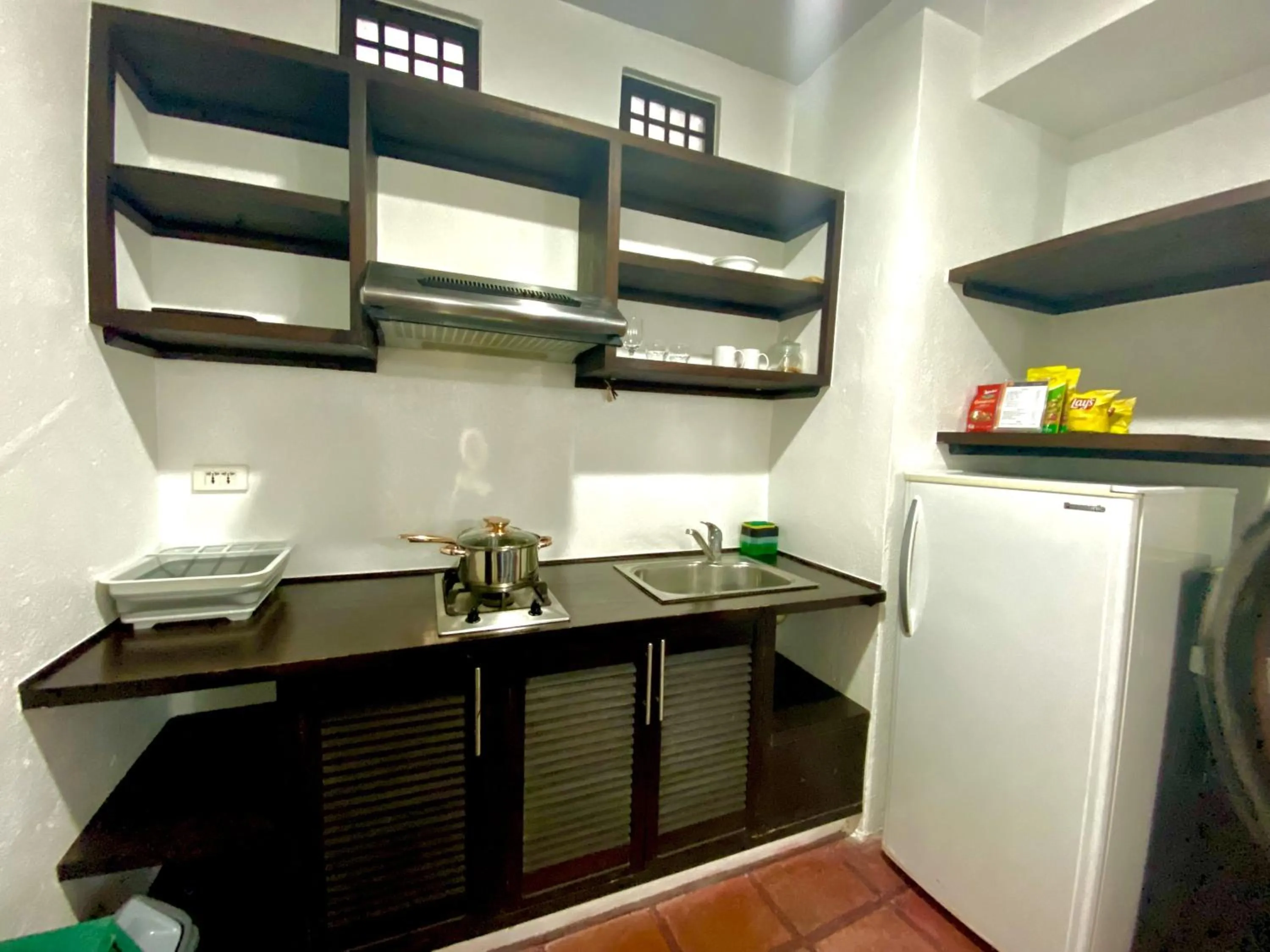 kitchen in Lalaguna Villas Luxury Dive Resort and Spa