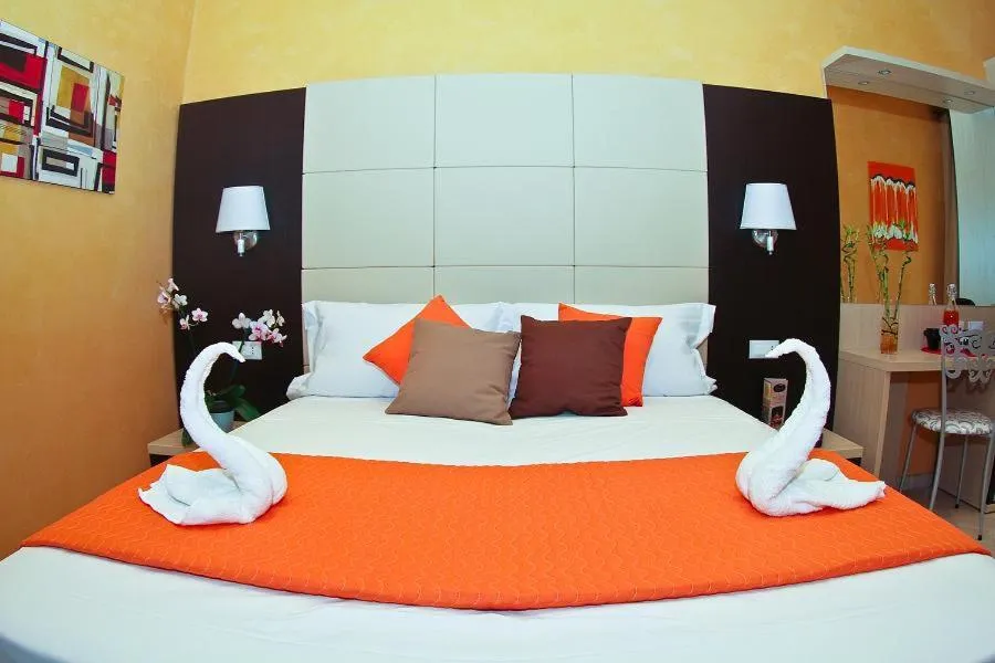 Bed in Candia Inn Vatican