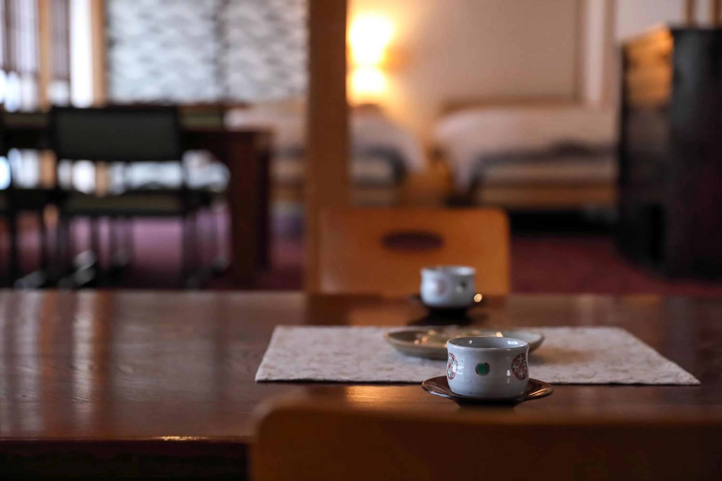 Living room, Bed in Tsukasaya Ryokan
