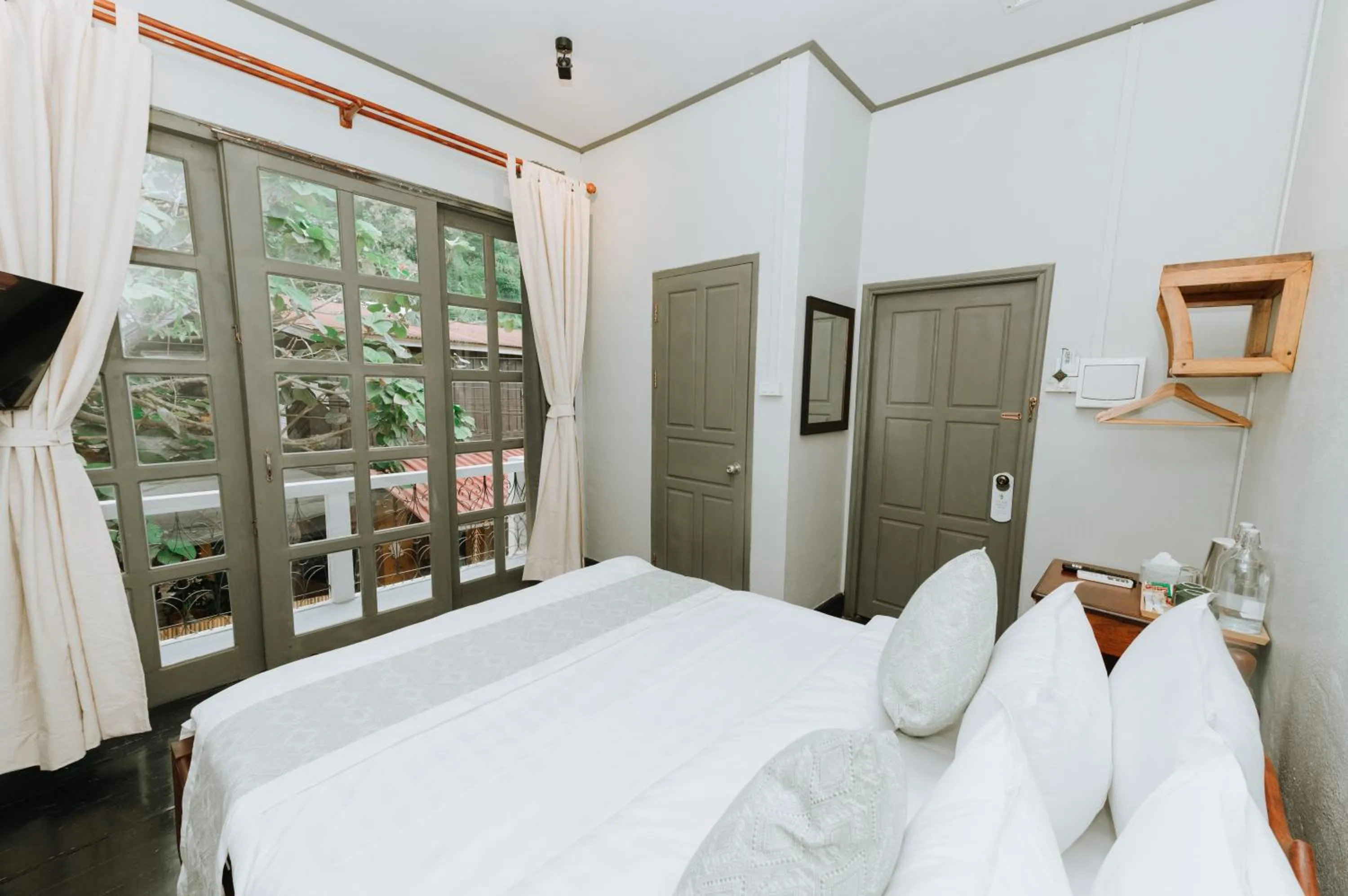 Bed in SamaiLaos Residence