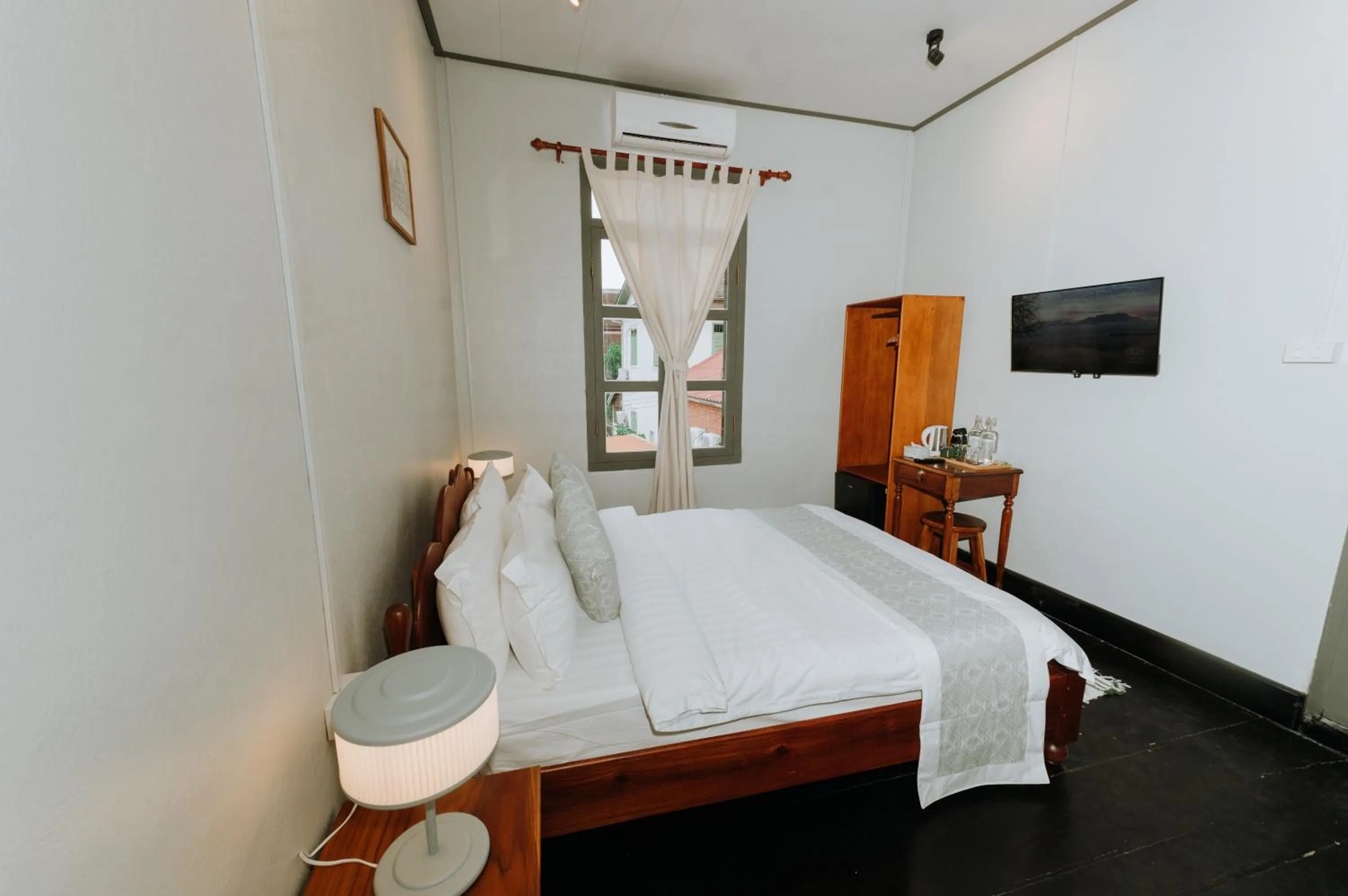 Bed in SamaiLaos Residence