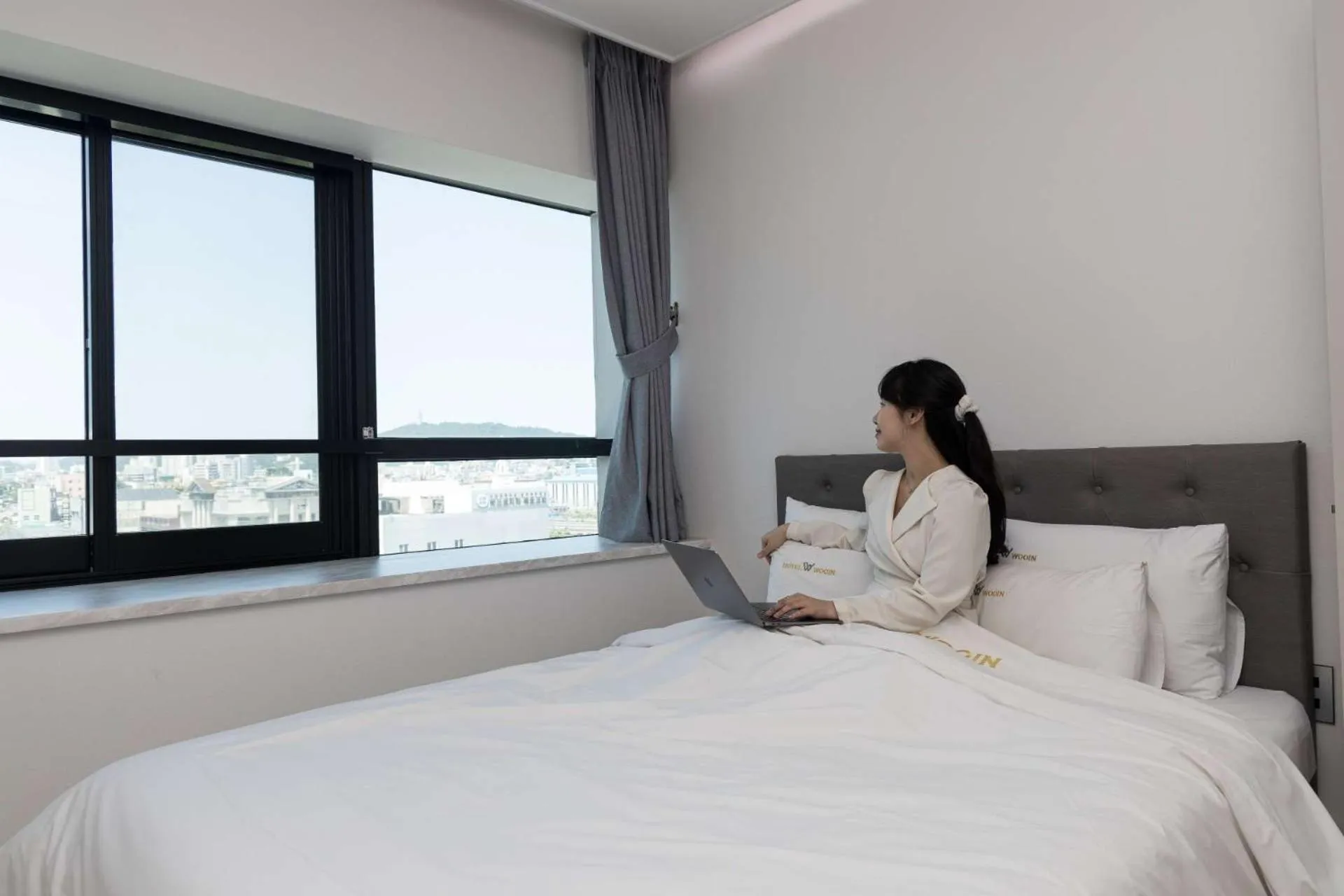 Bedroom, Bed in Hotel Wooin