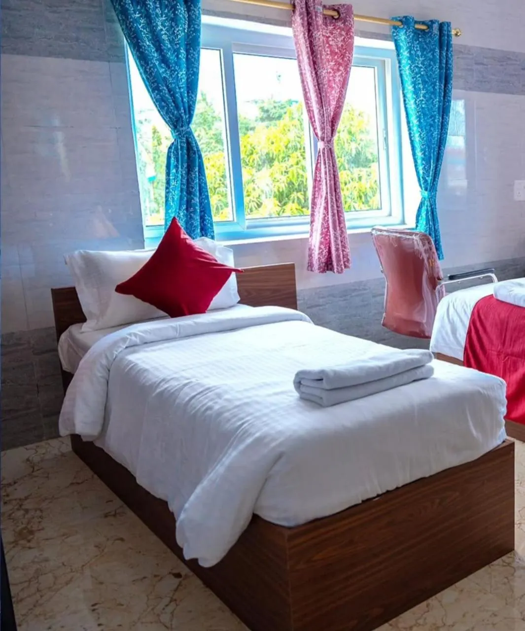 Bed in Hotel Mirka Plaza