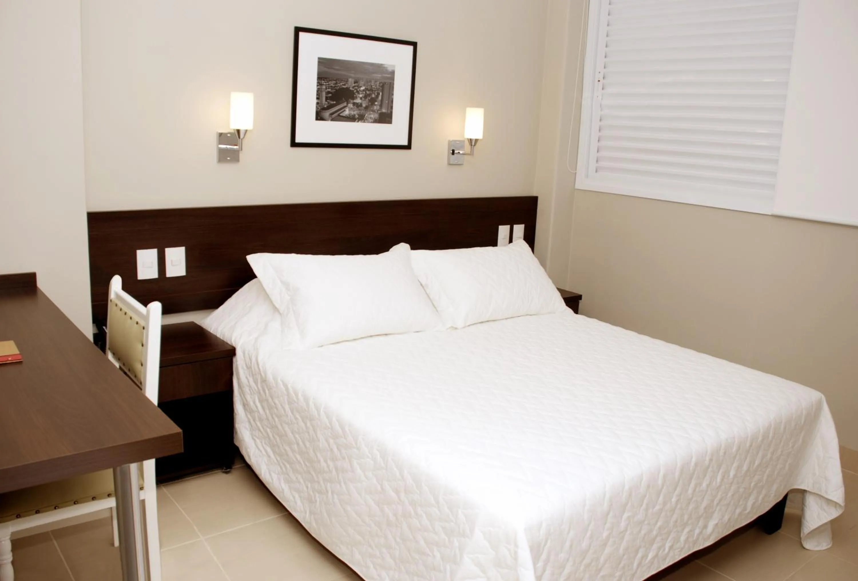 Photo of the whole room, Bed in Lider Hotel Ituiutaba