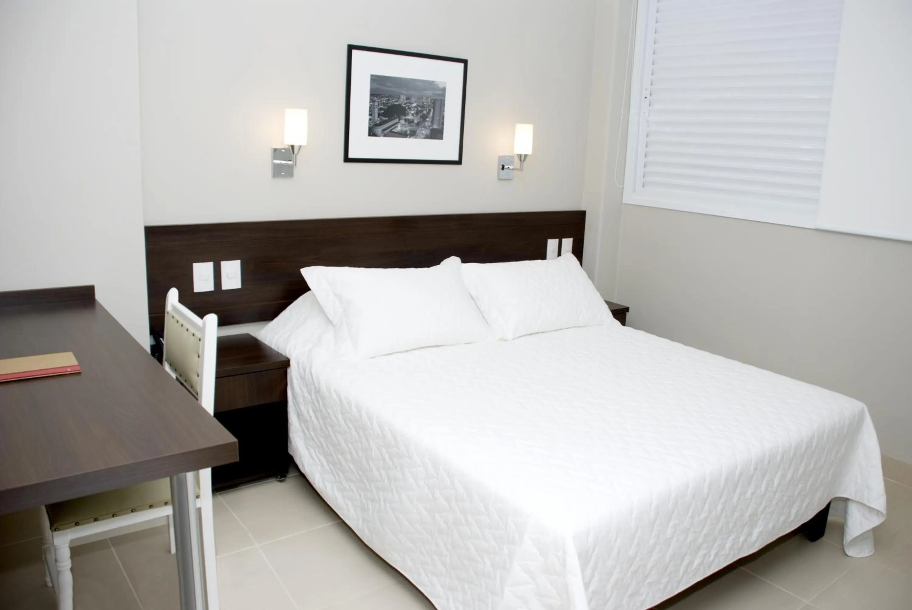 Photo of the whole room, Bed in Lider Hotel Ituiutaba