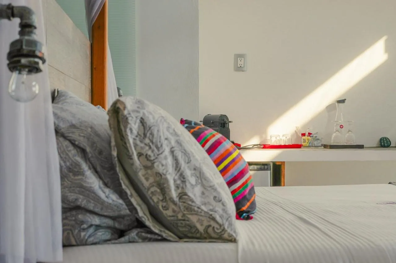 Bed in Villa Aikia (Adults Suites A/C)