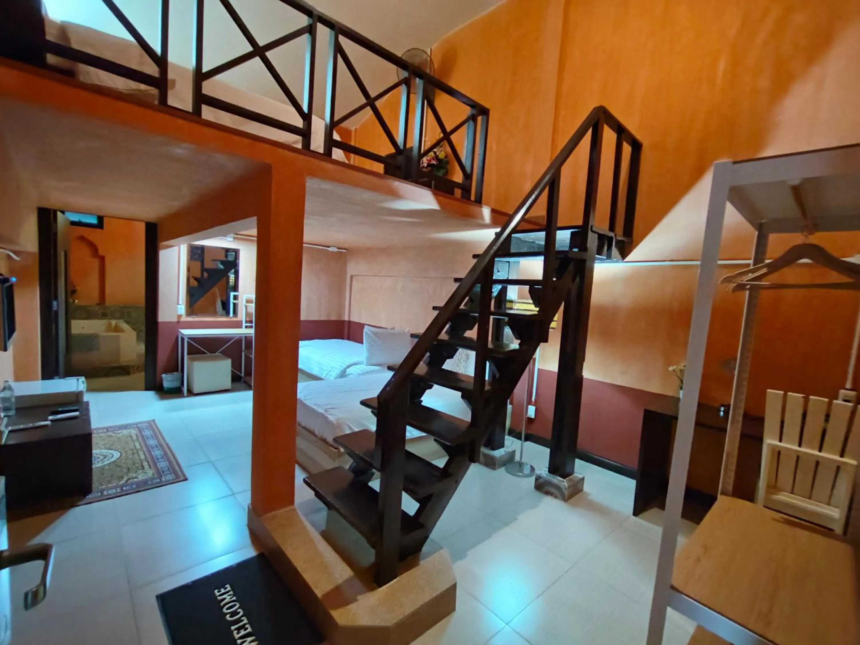 Bed in Retro Box Hotel Chumphon