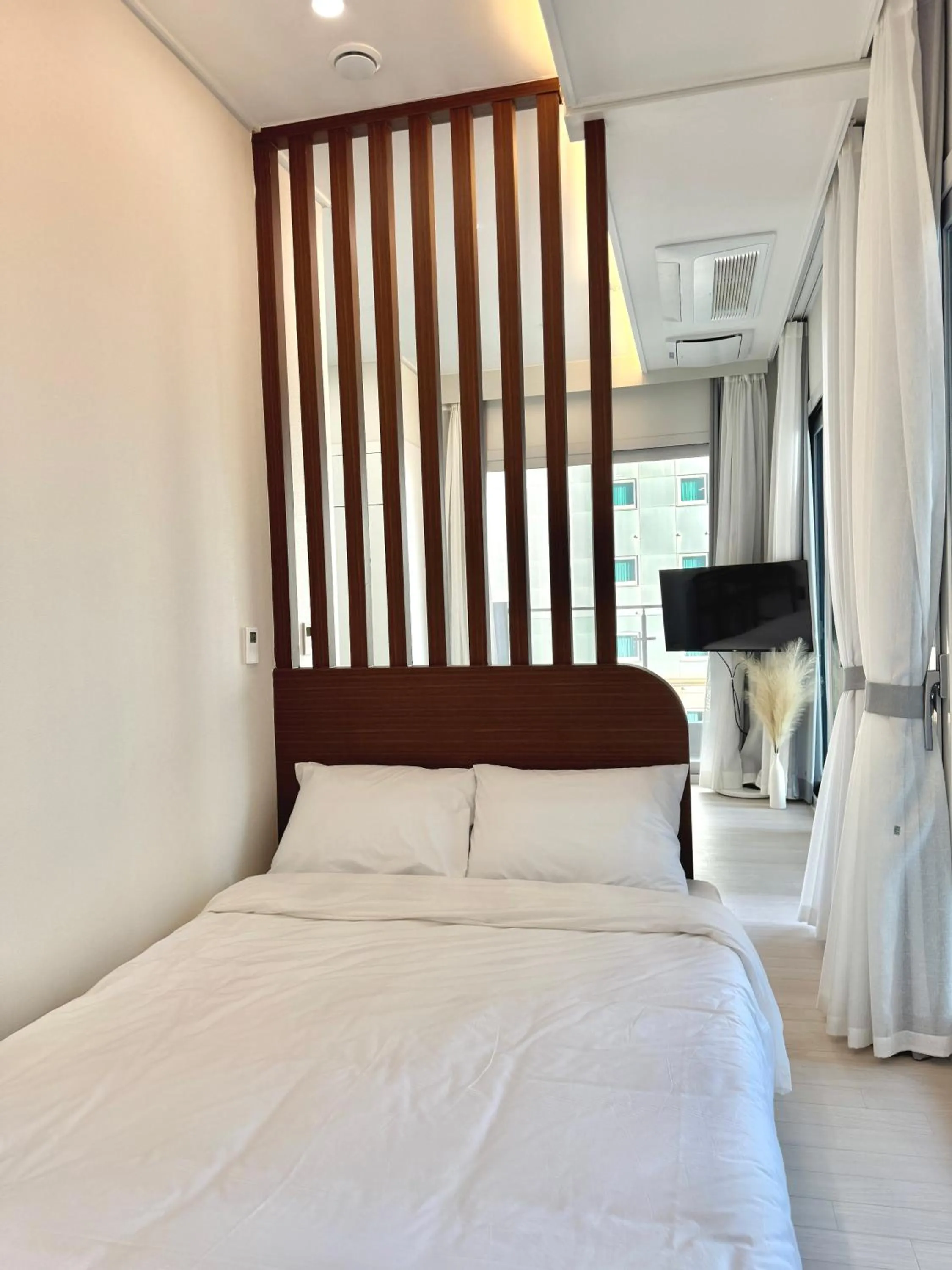 Bed in Raviens Maison de Hotel