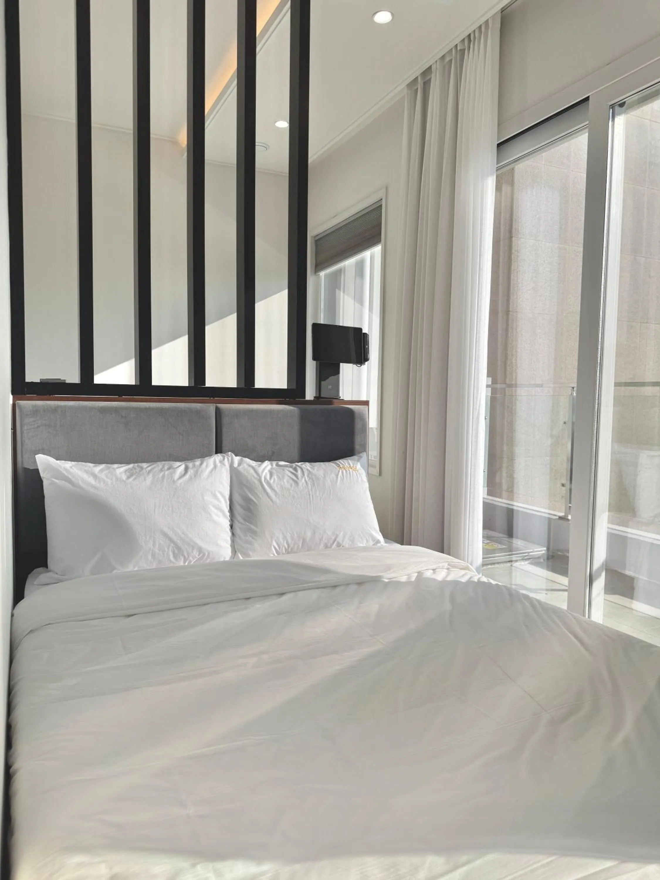 Bed in Raviens Maison de Hotel