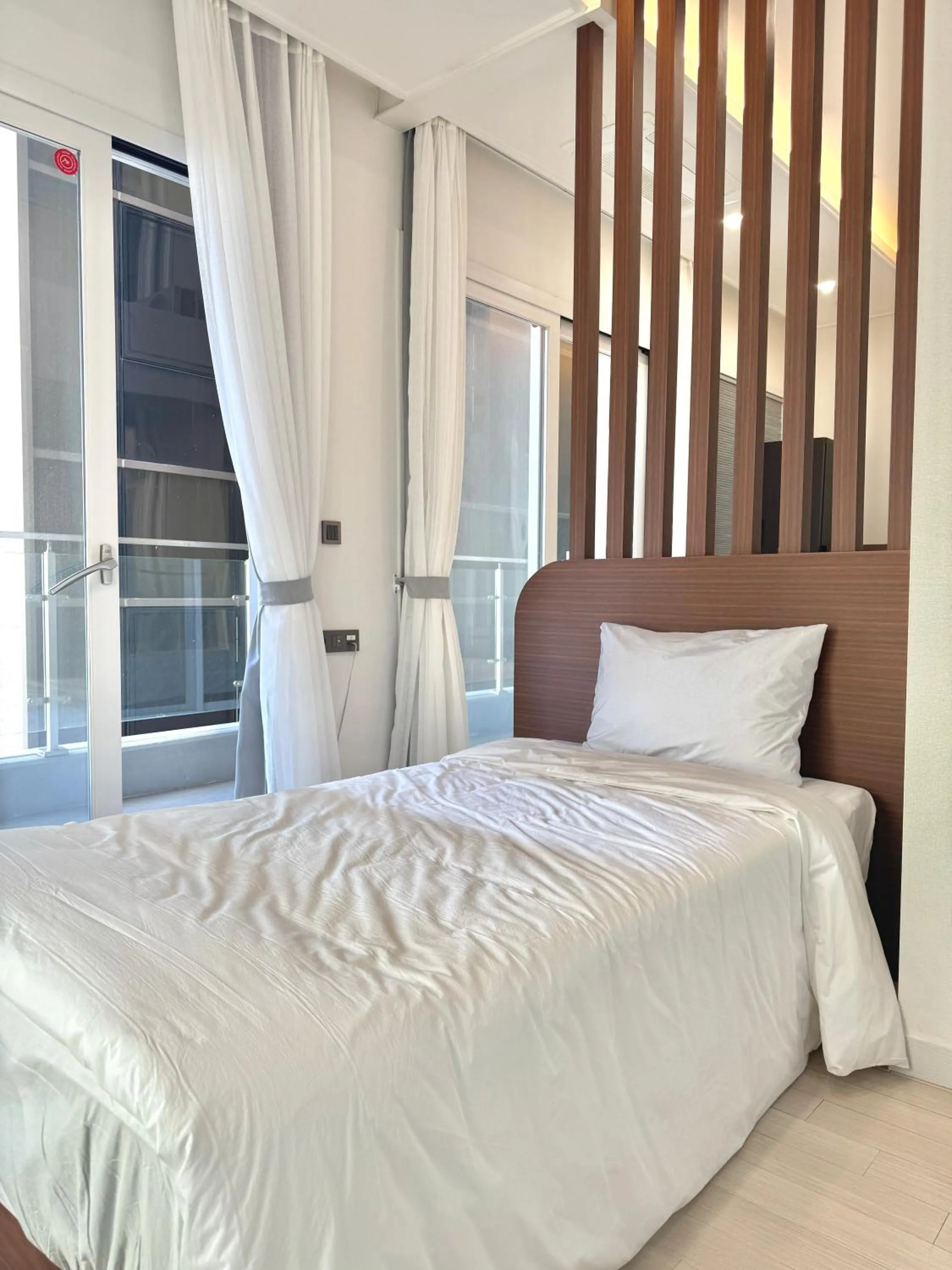 Bed in Raviens Maison de Hotel