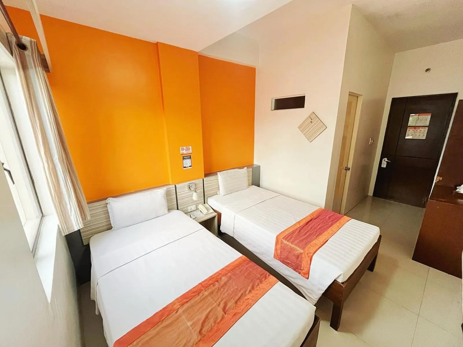 Bedroom in Travelbee Business Inn