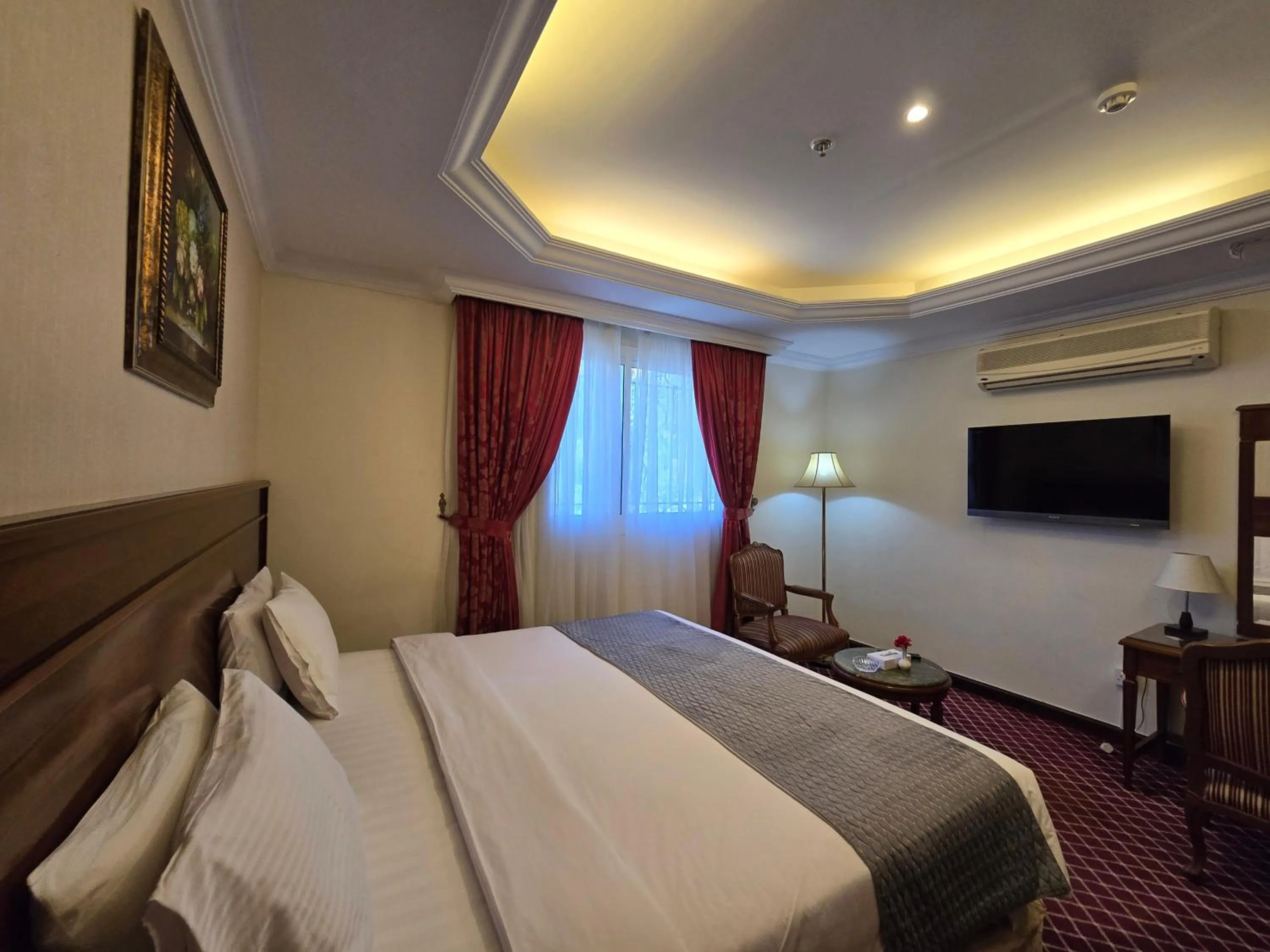 Bed in Taj Celine Hotel