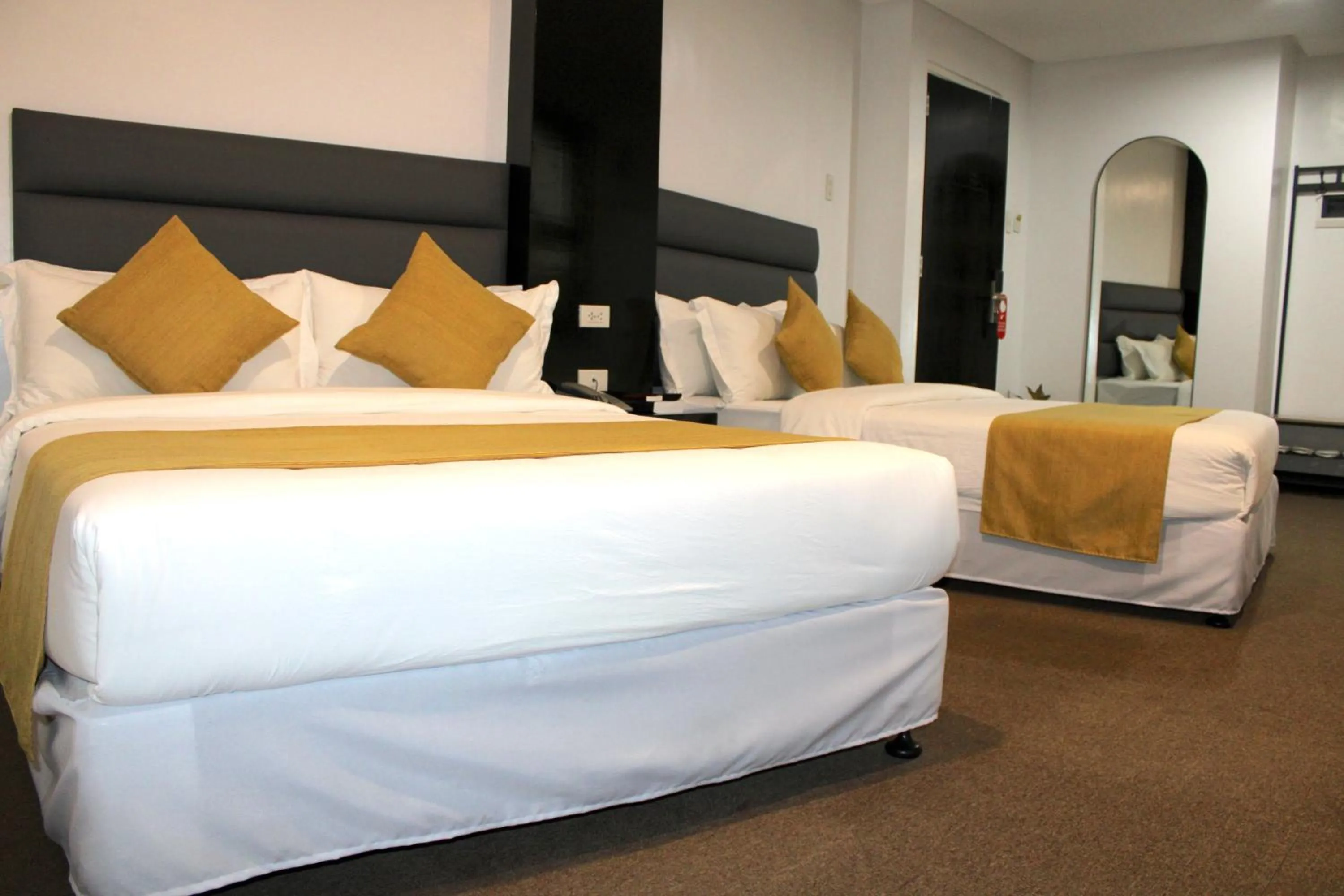 Photo of the whole room, Bed in Dancenter Boss Hotel Near Clark International Airport